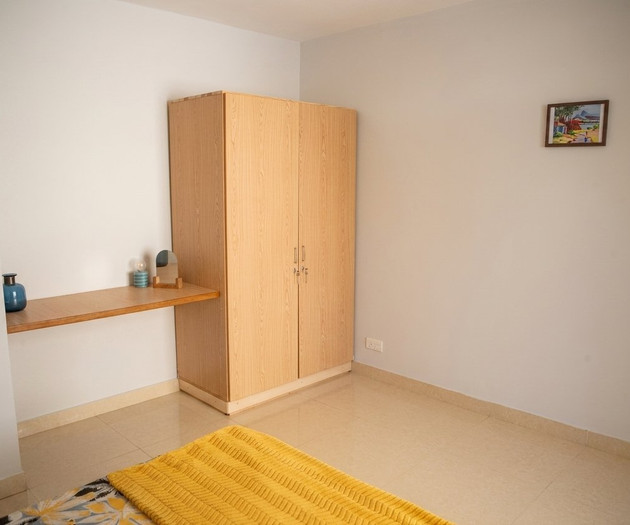 Bedroom with wooden wardrobe
