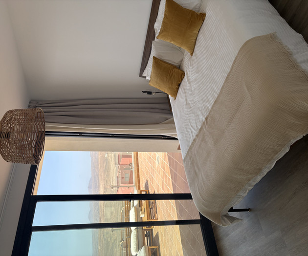 Bedroom with balcony access