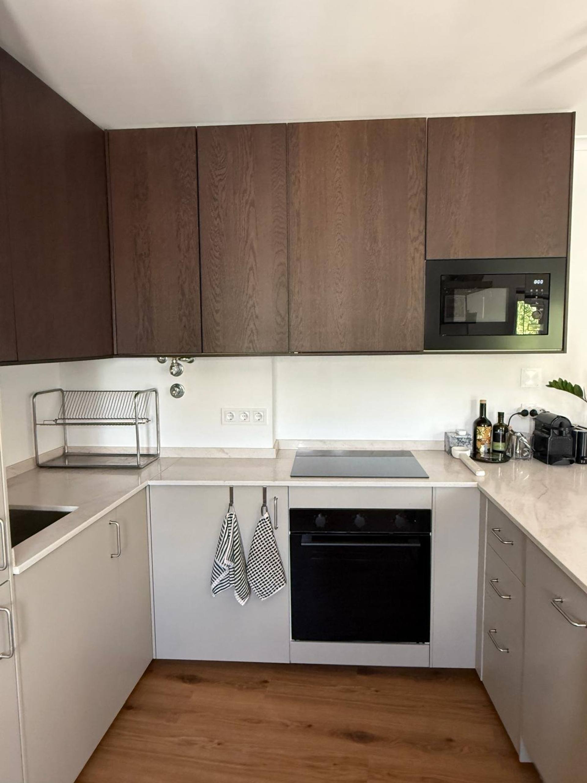 Modern kitchen with dark wood cabinets