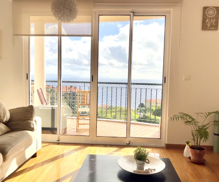modern, large room with sea-view balcony