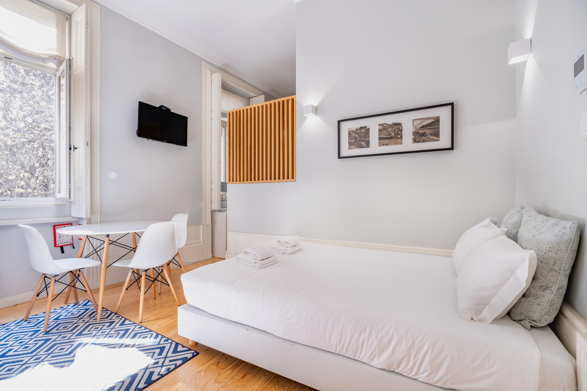 Double bed, dining area and TV 