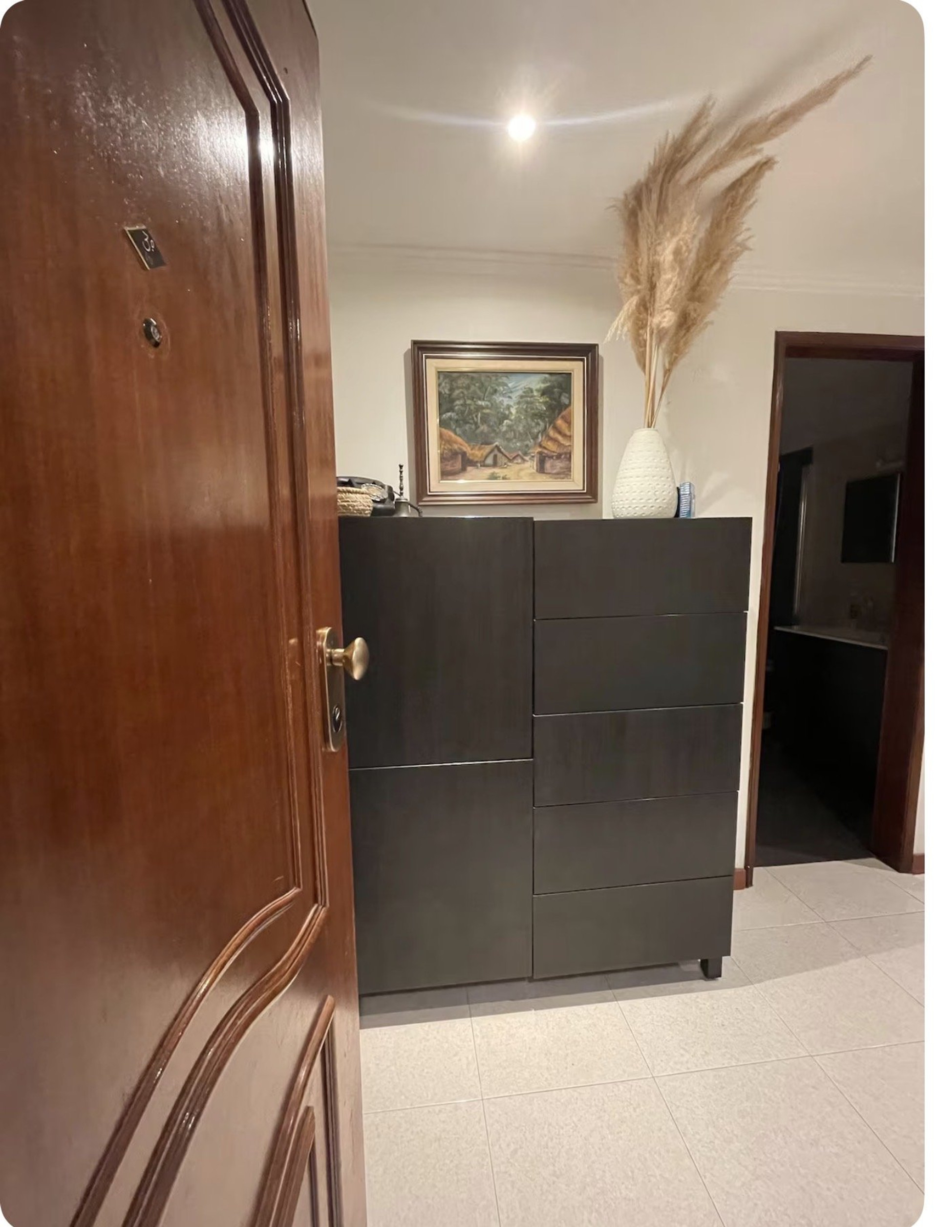 Entryway with dresser and mirror