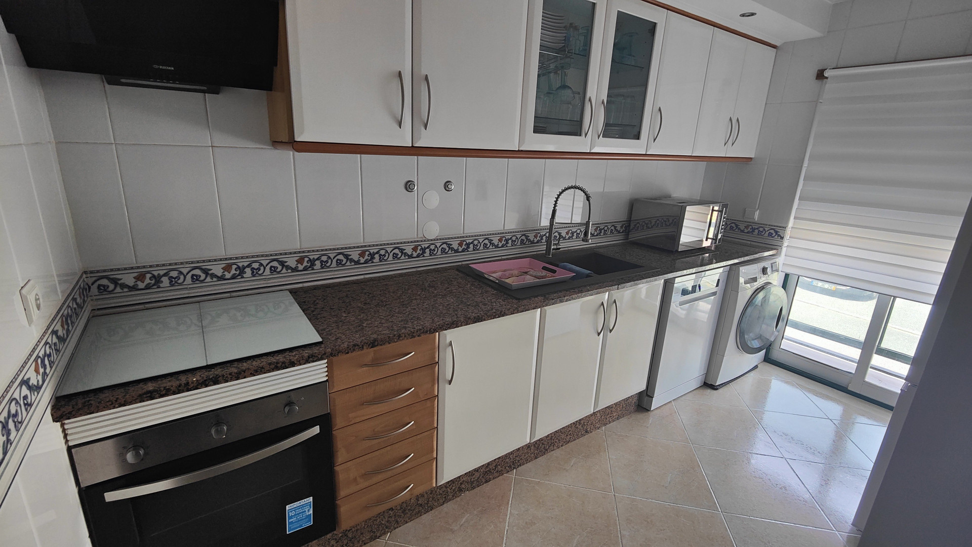 Kitchen with oven and sink