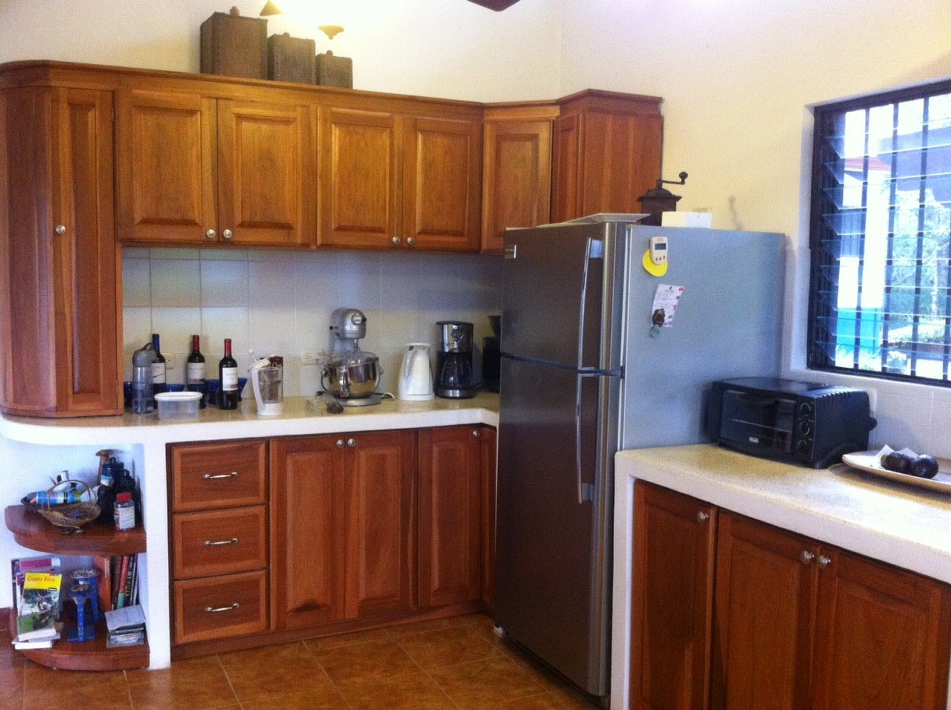 Full kitchen with wood cabinets