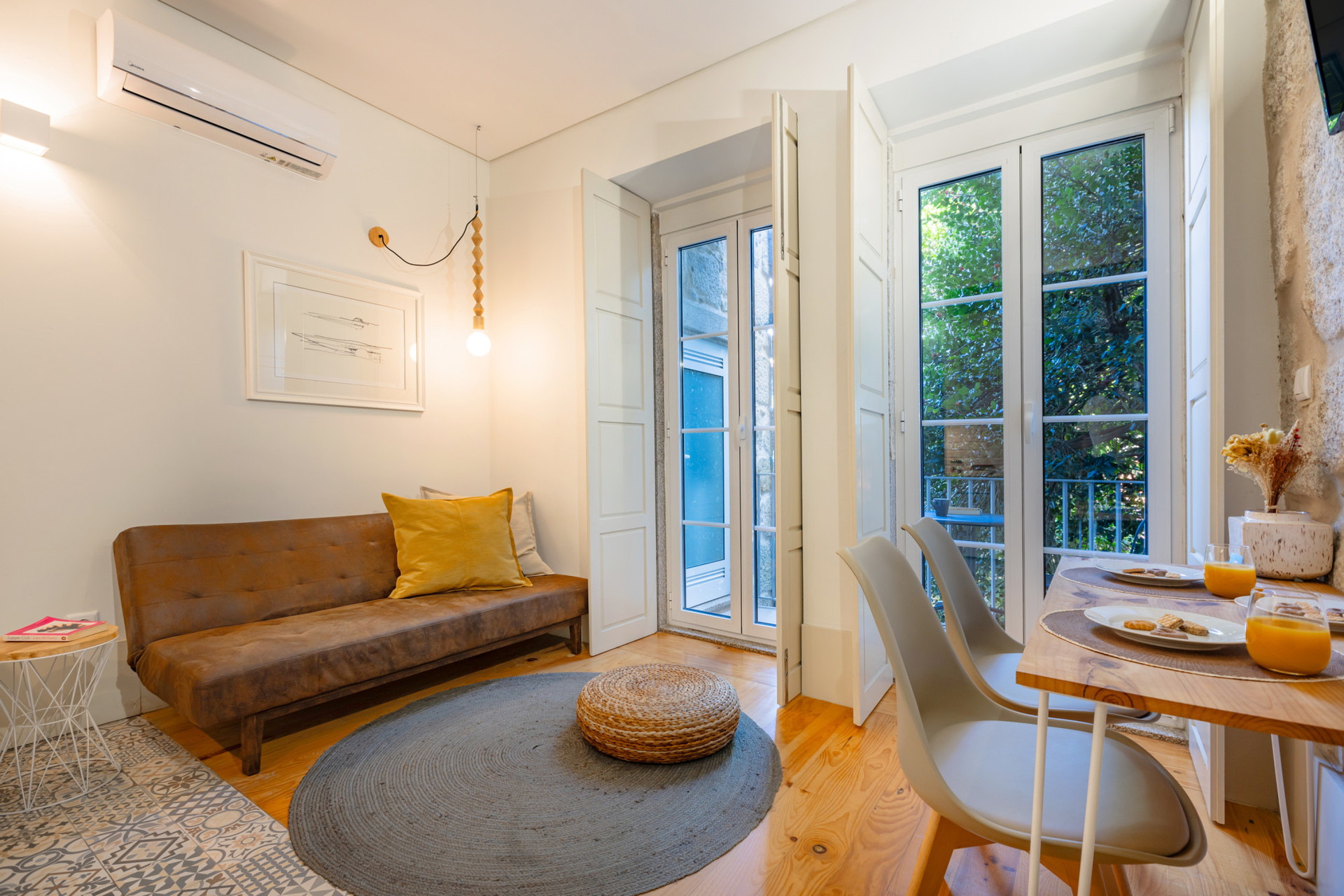 Living Room with a Sofa and a Table for 2 People