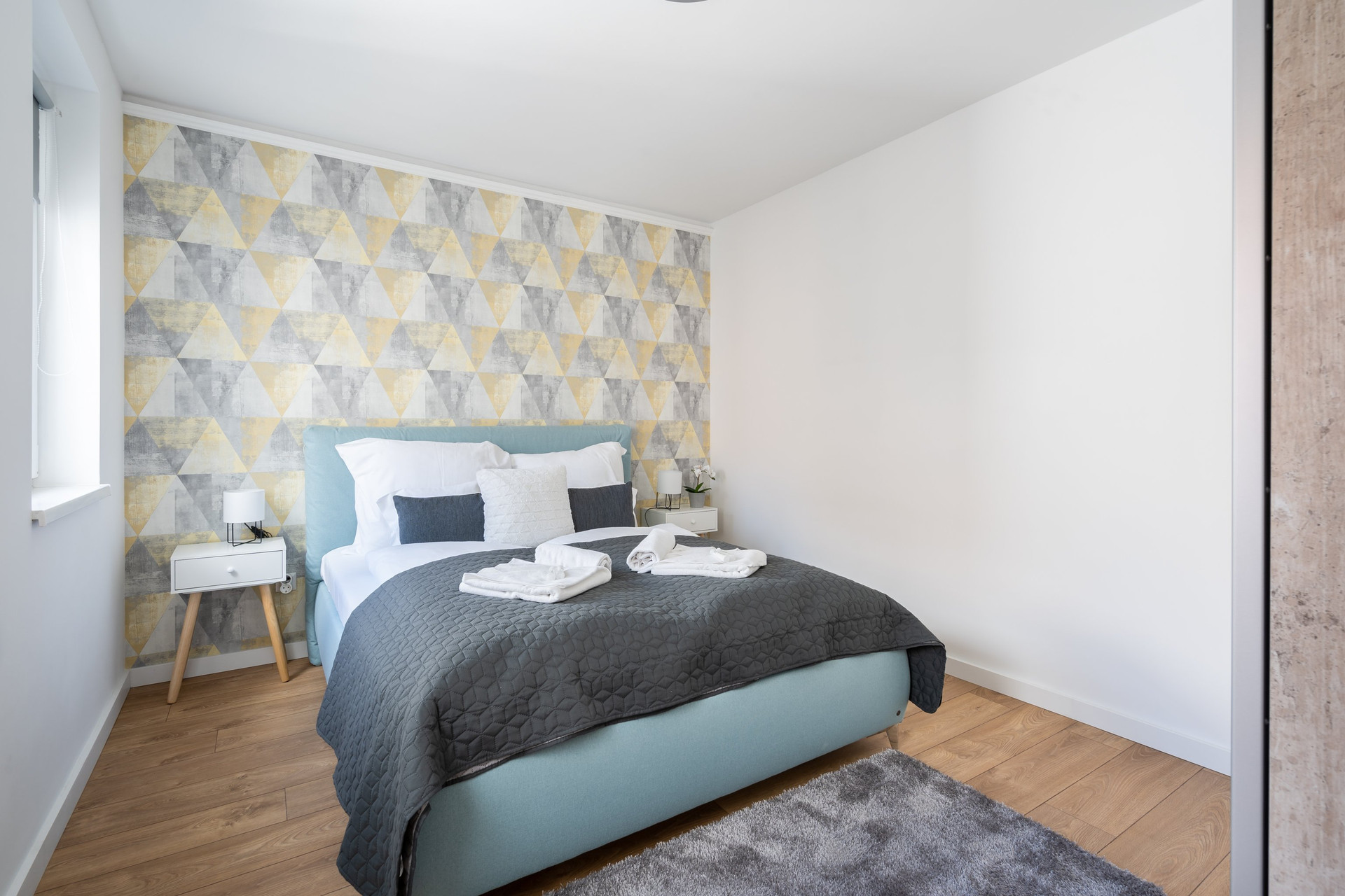 Bright bedroom with double bed