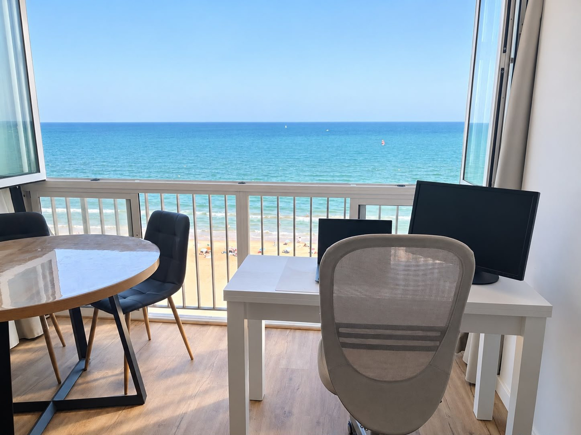 Balcony dining table with ocean view