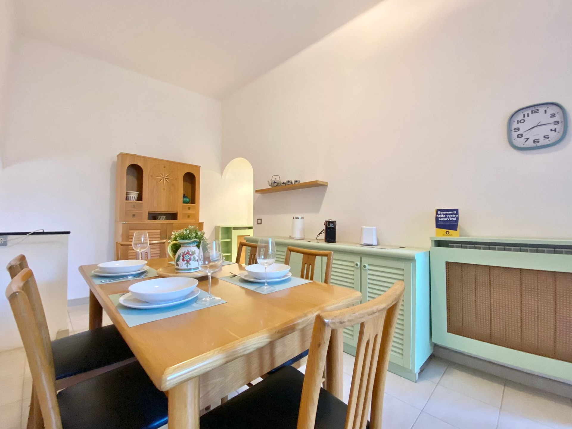 Dining room with green sideboard