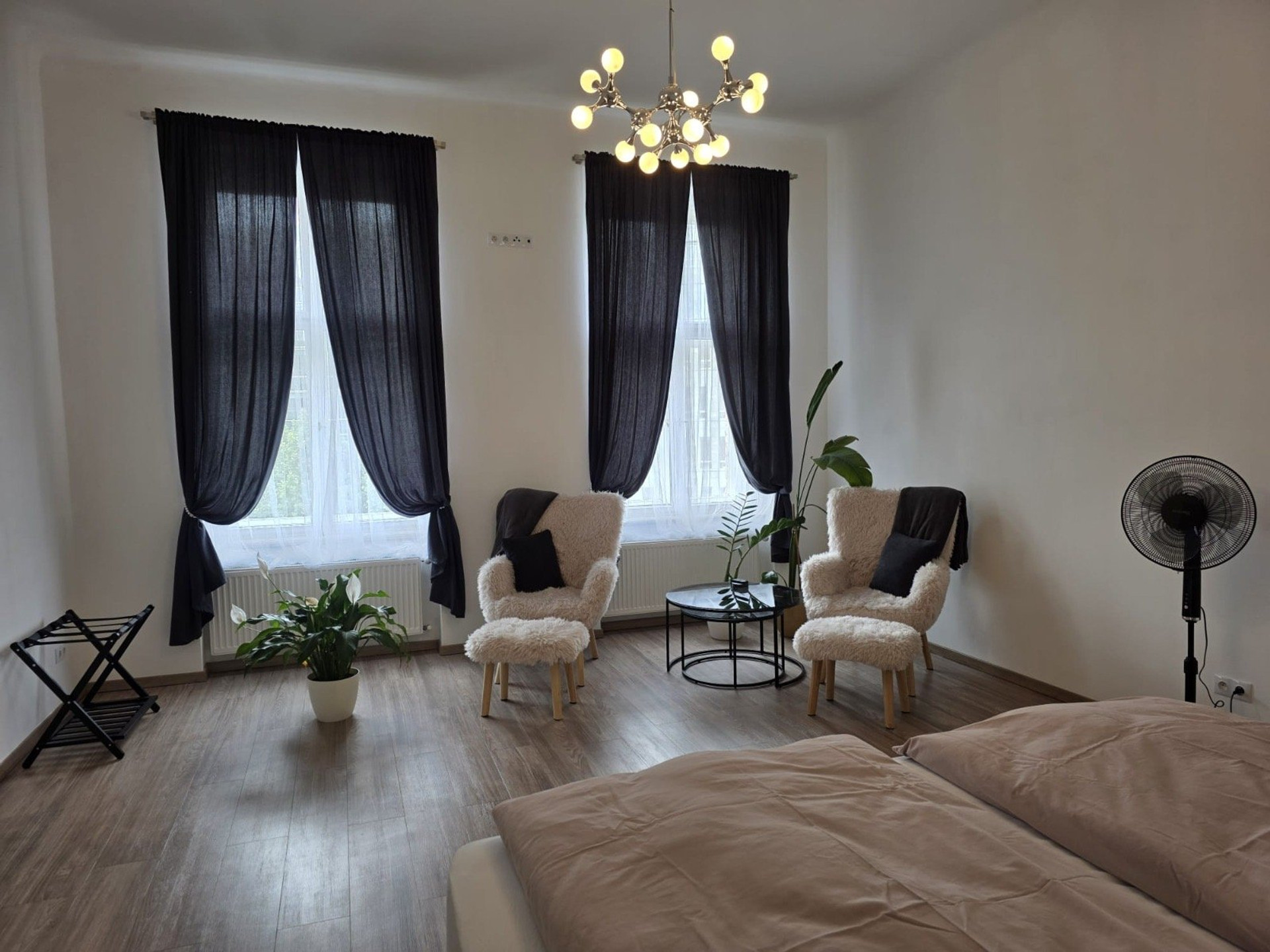 Spacious bedroom with seating area