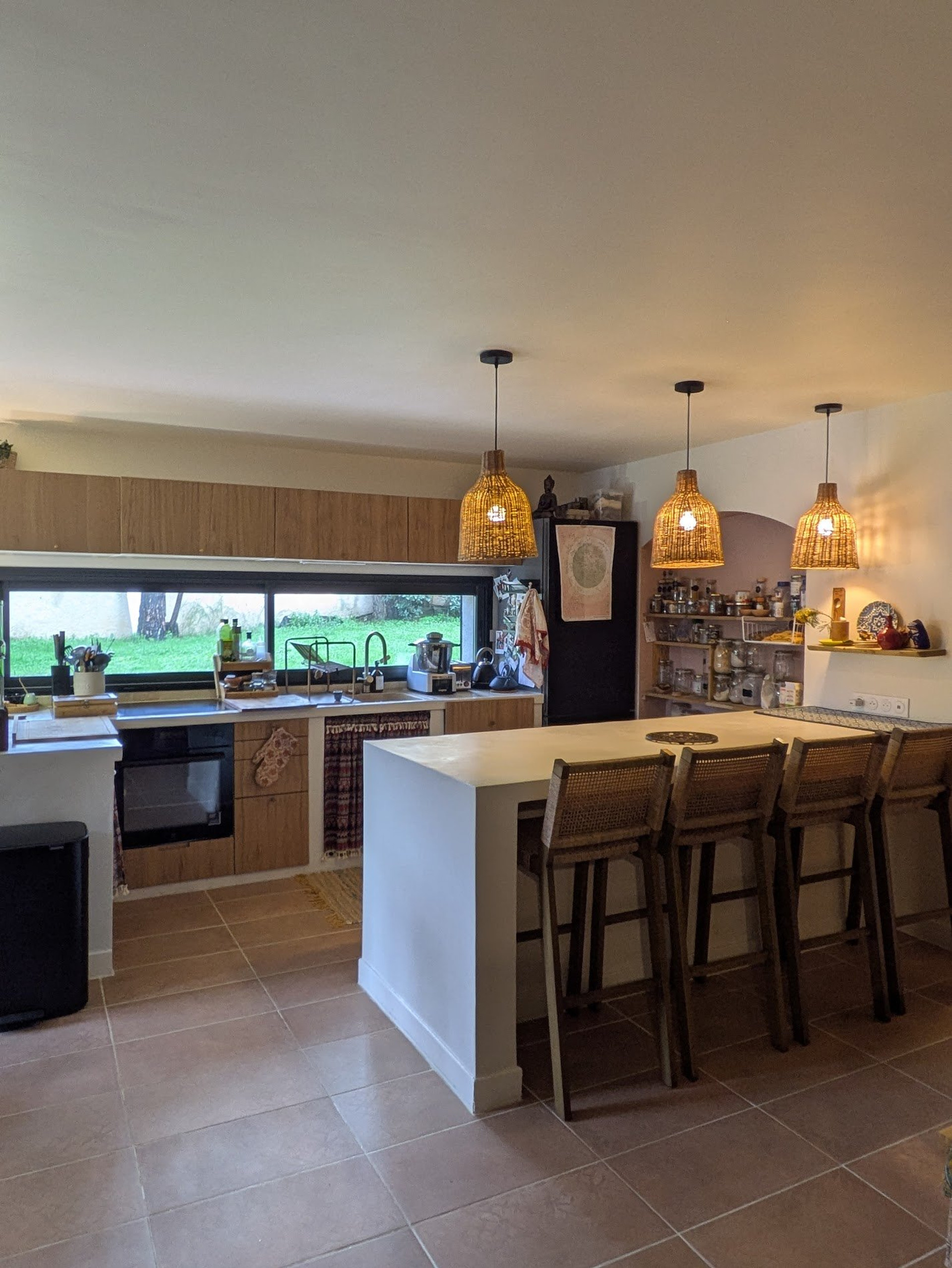 Bright kitchen with island bar stools