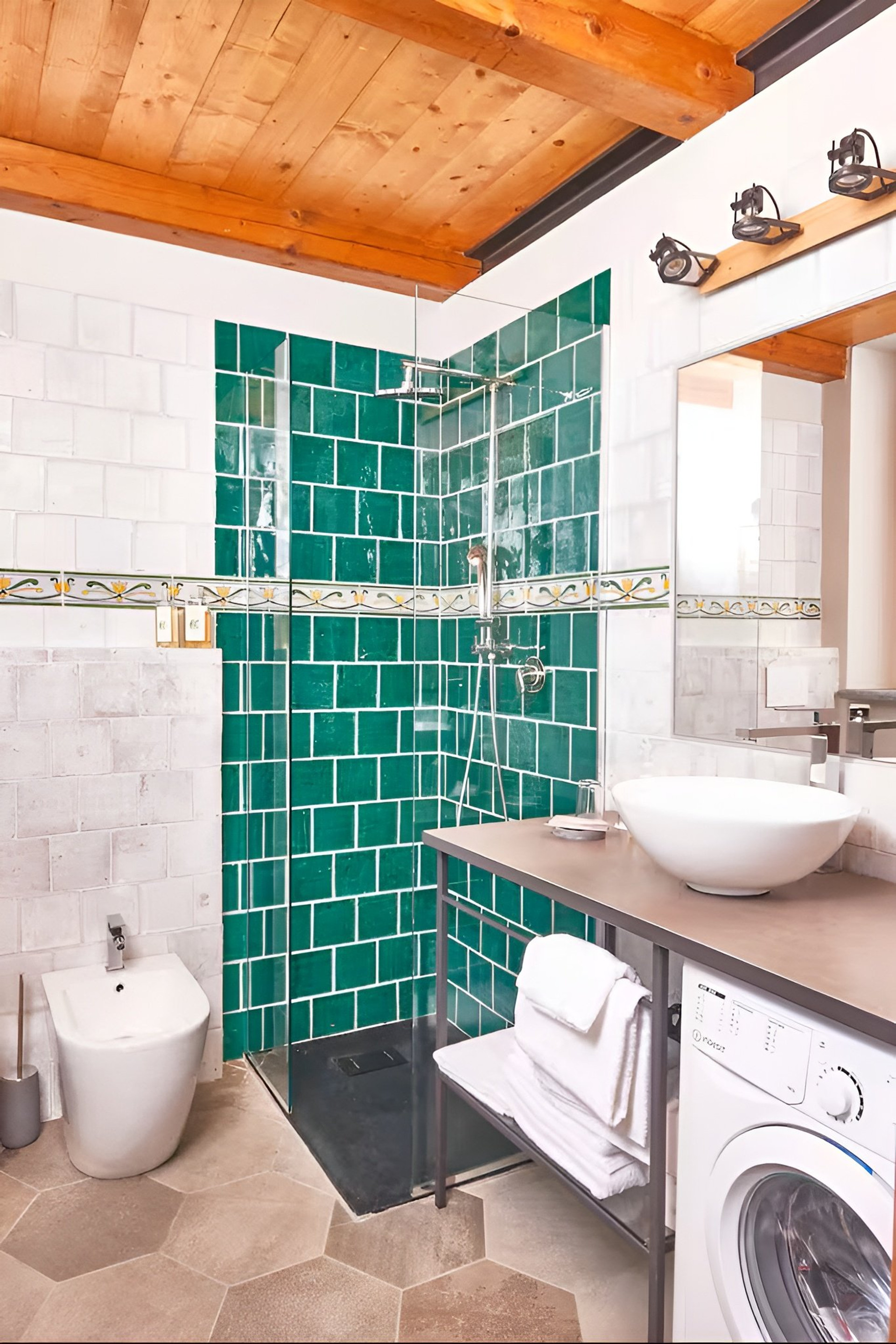 Bathroom with shower and washing machine