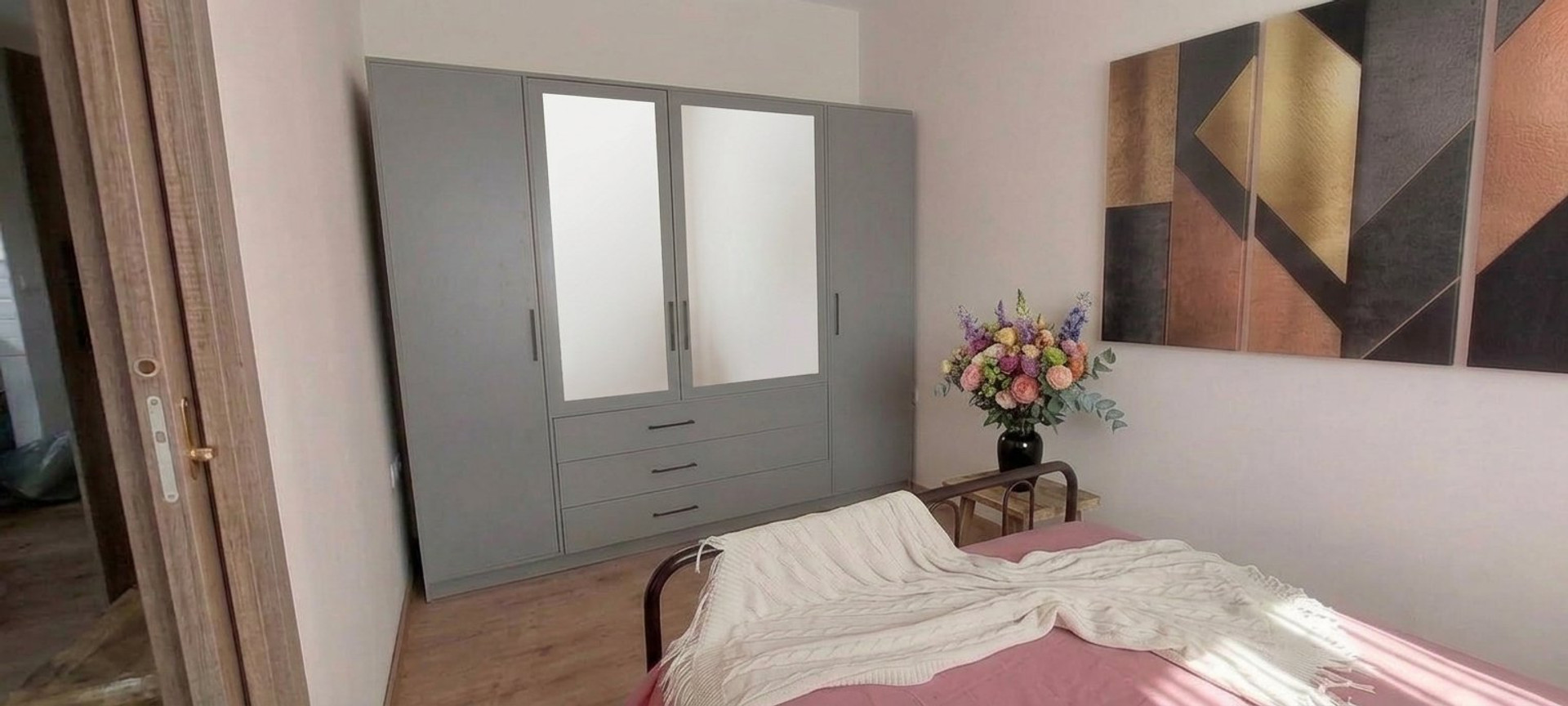 Bedroom with large wardrobe