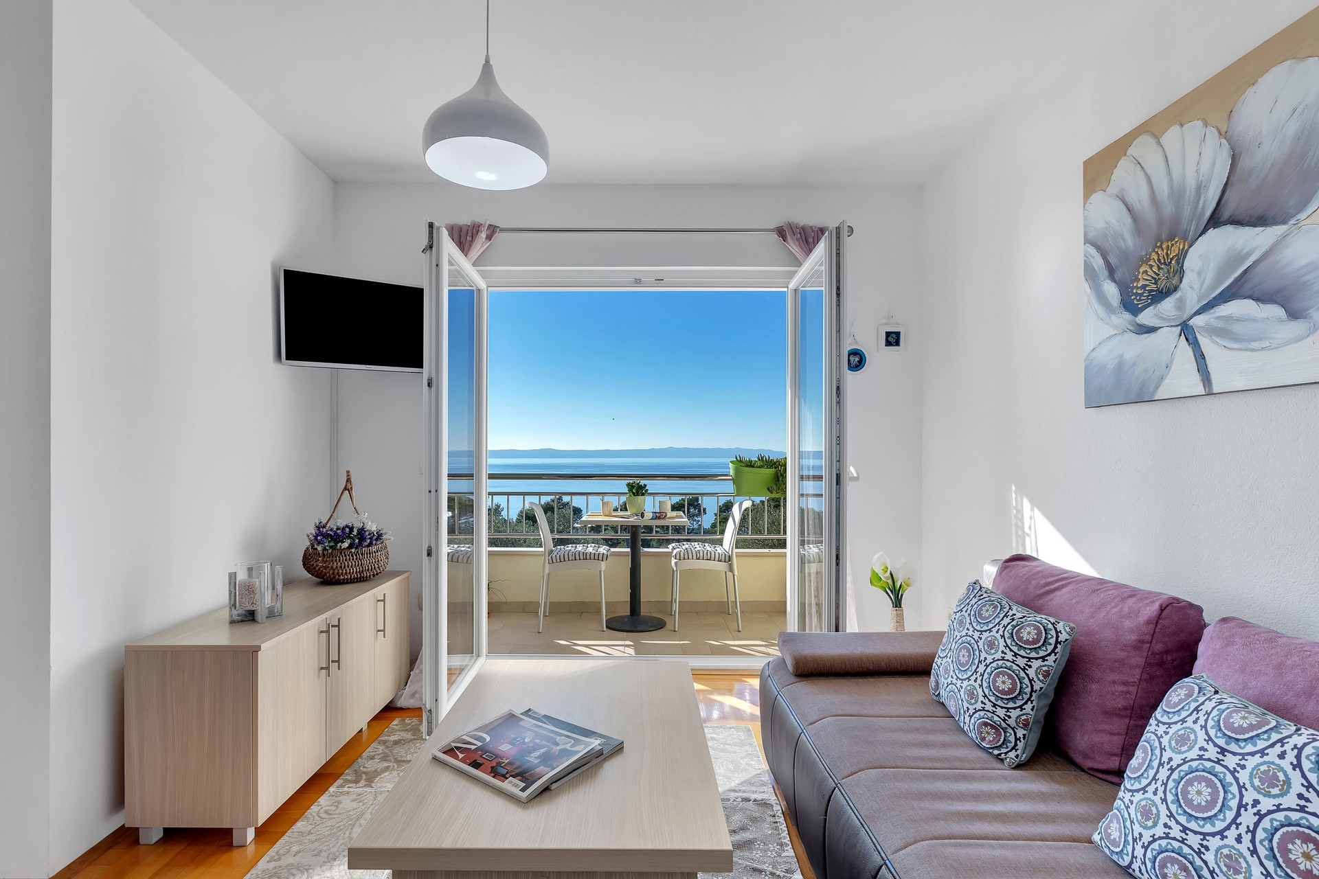 Living room opening to balcony