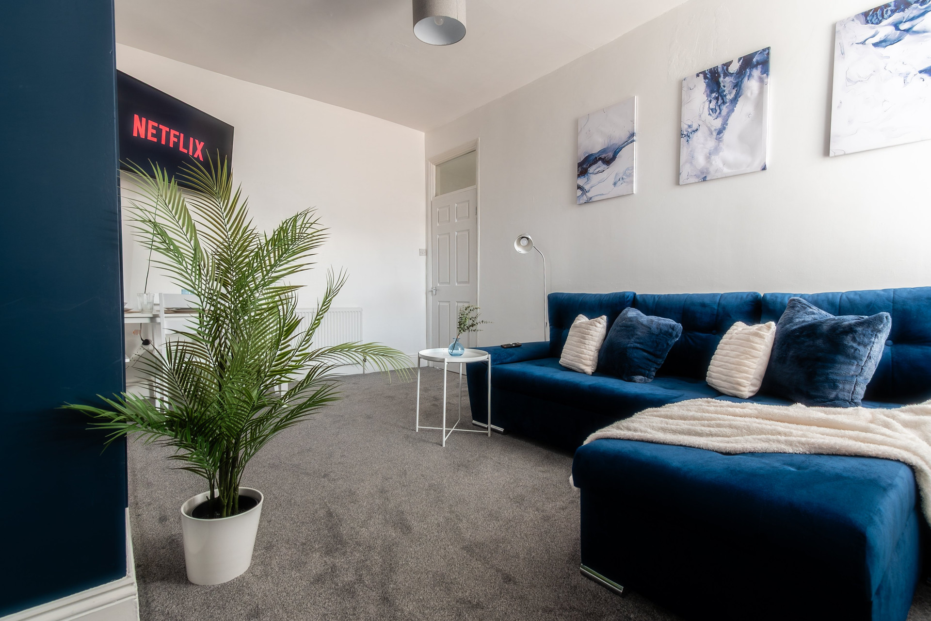 Cozy blue velvet sofa lounge