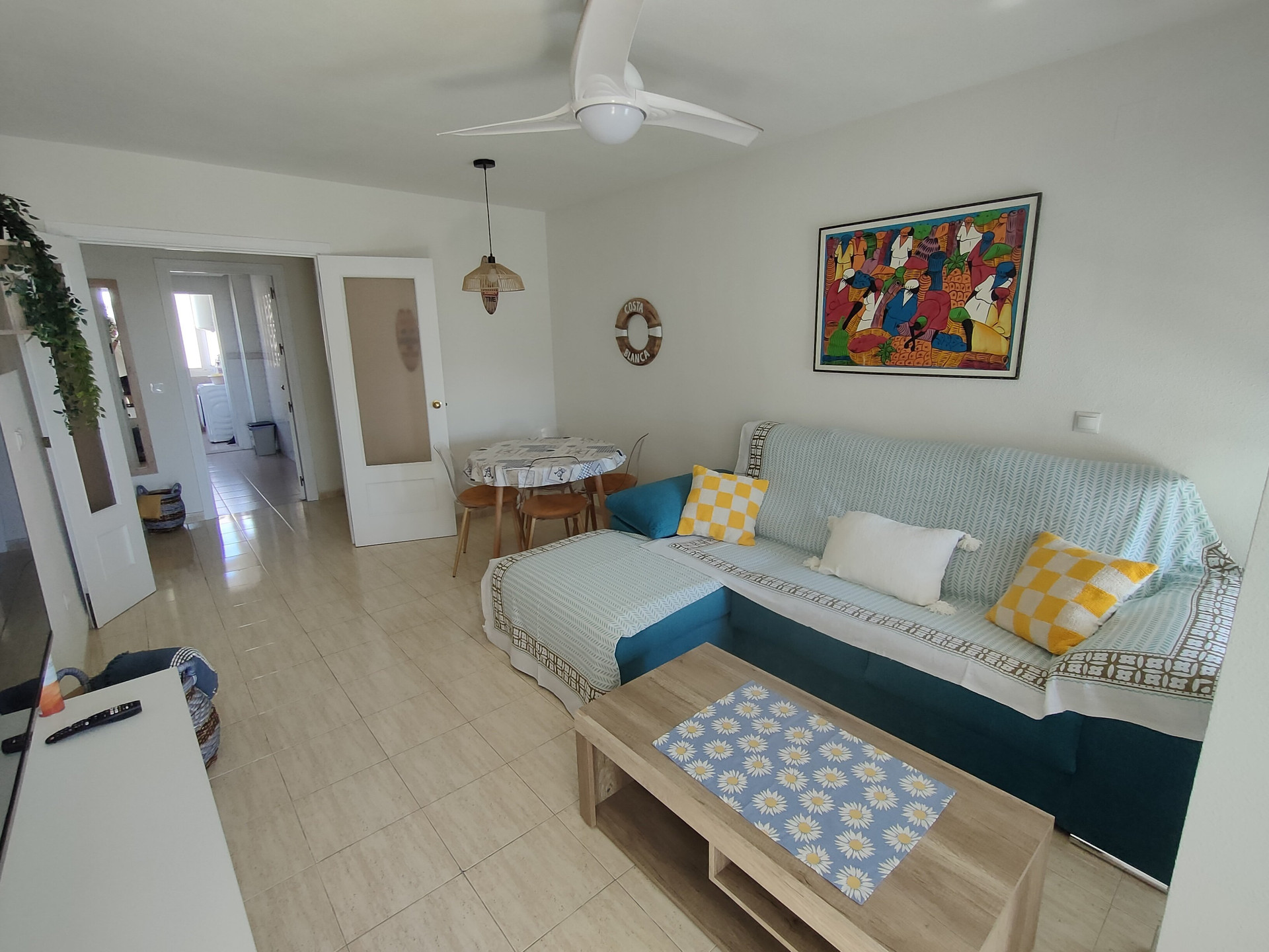 Bright living area with sofa