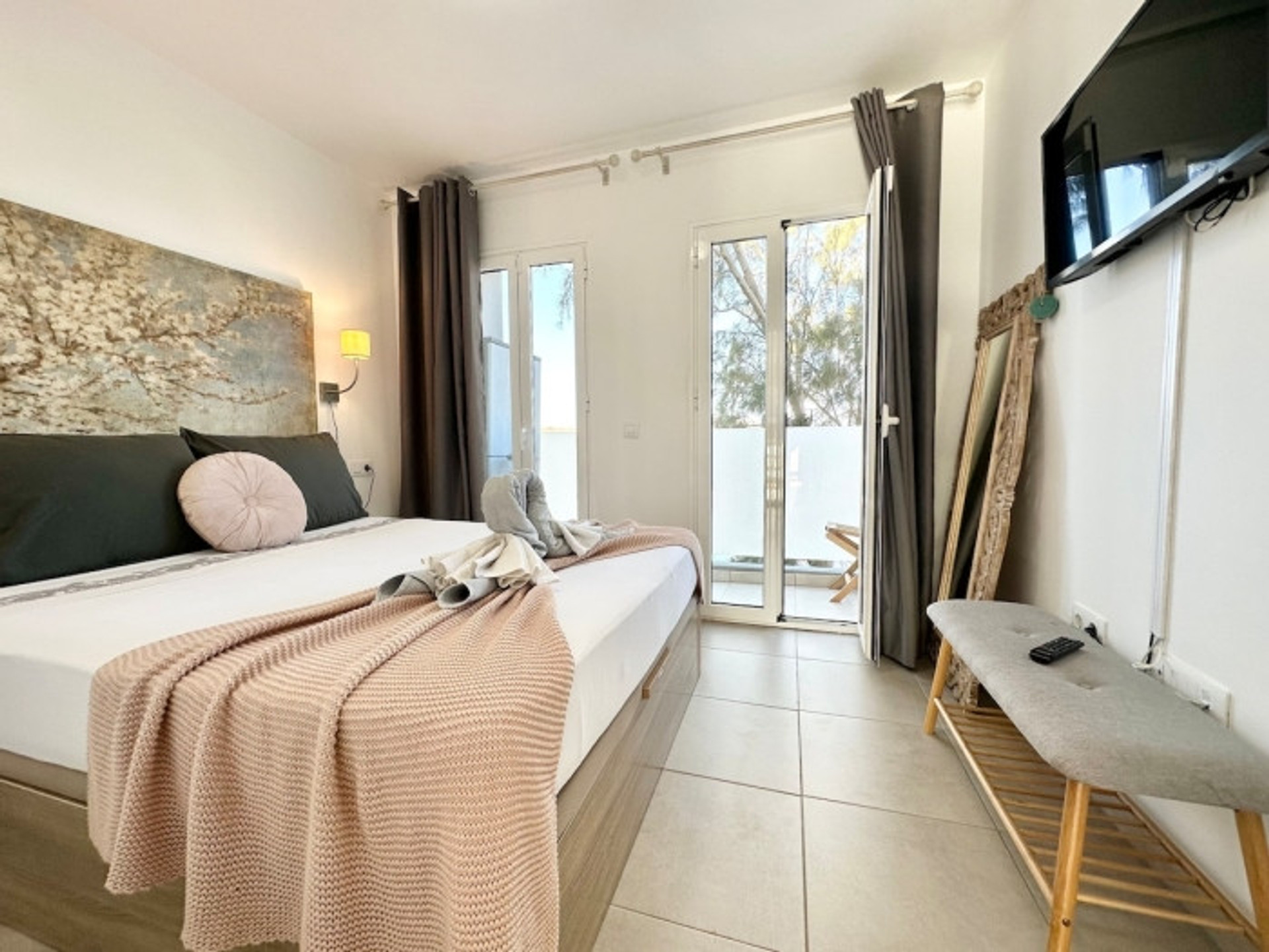 Master bedroom with balcony access