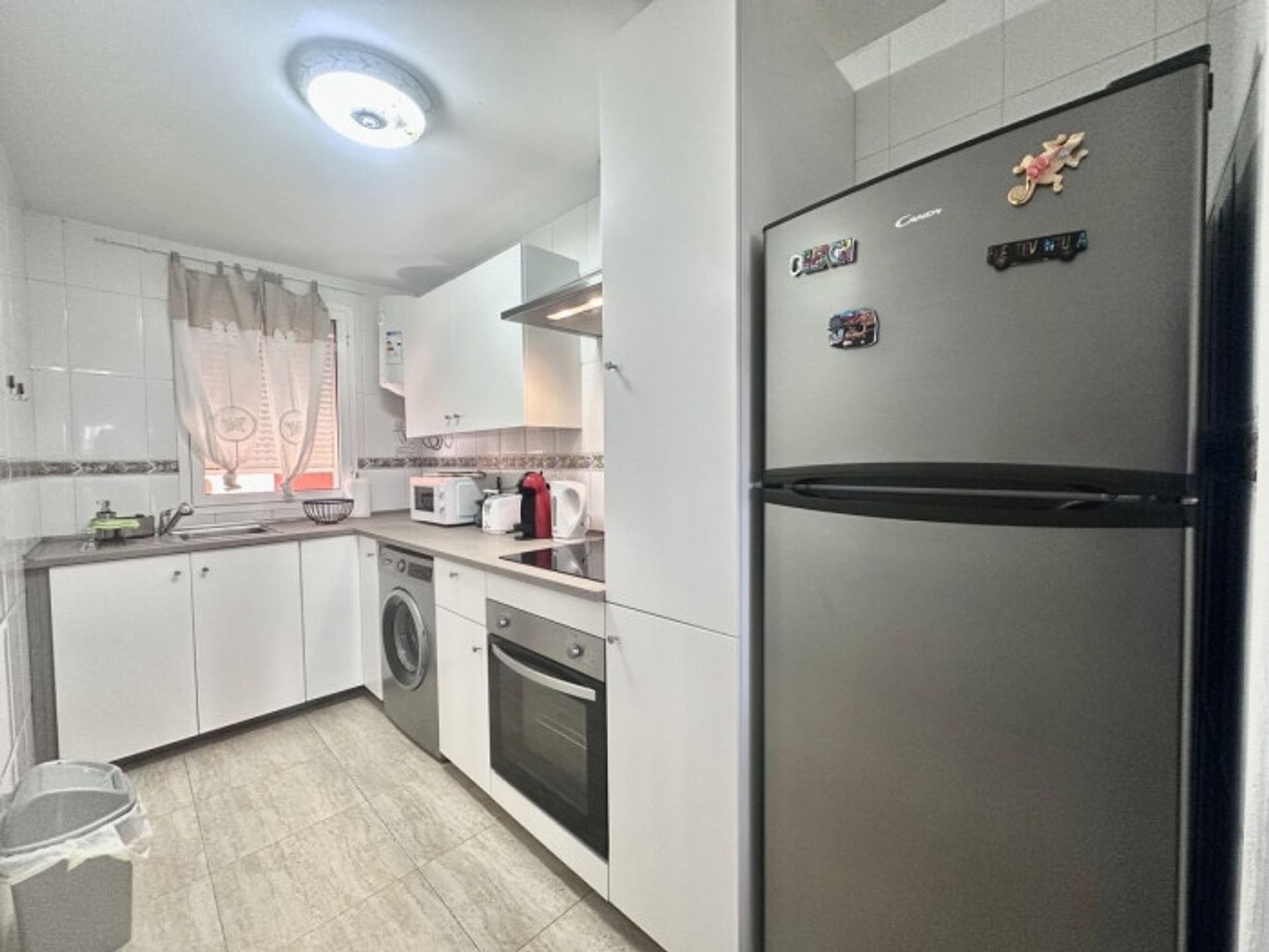 White kitchen with appliances