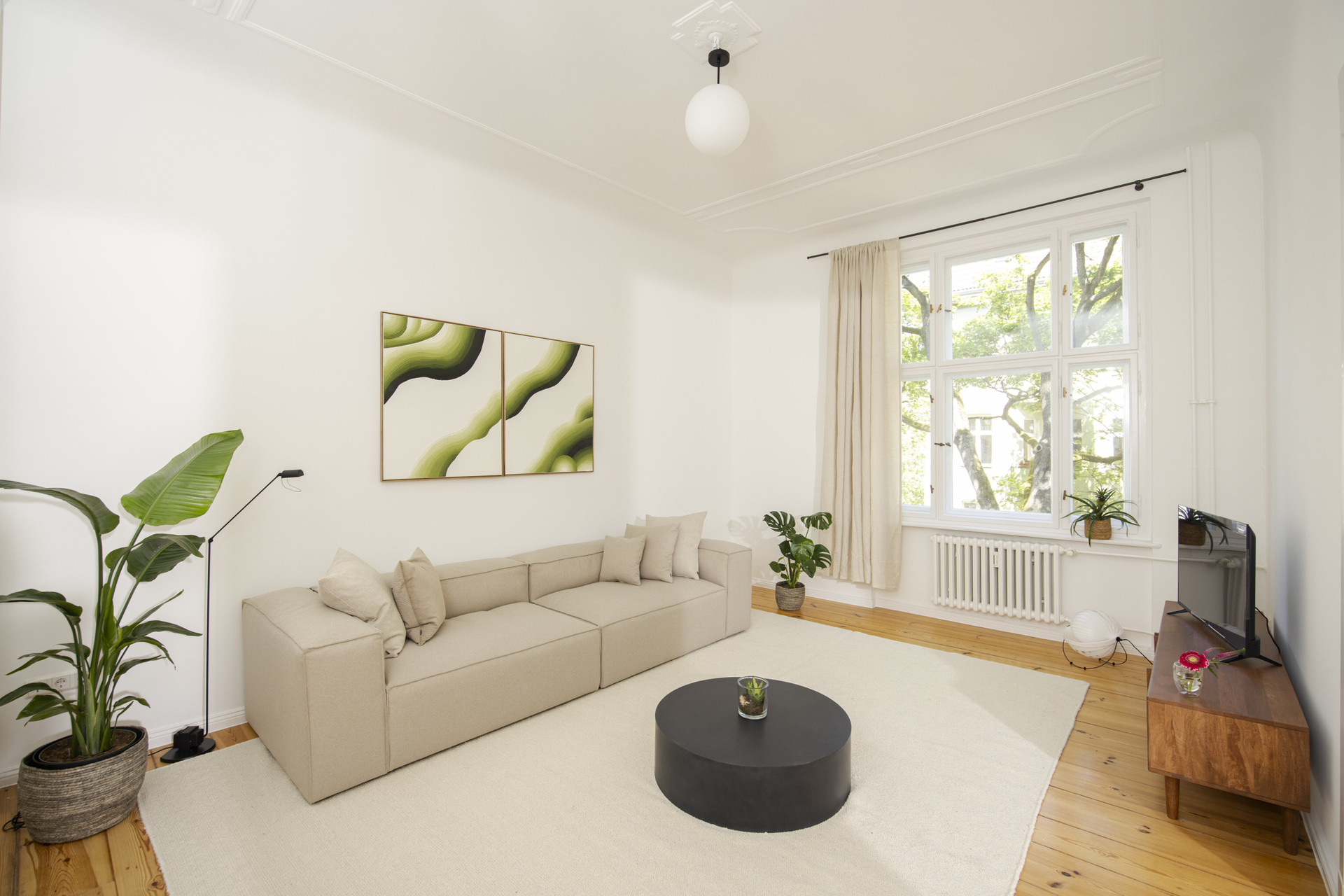 Bright living room sofa artwork