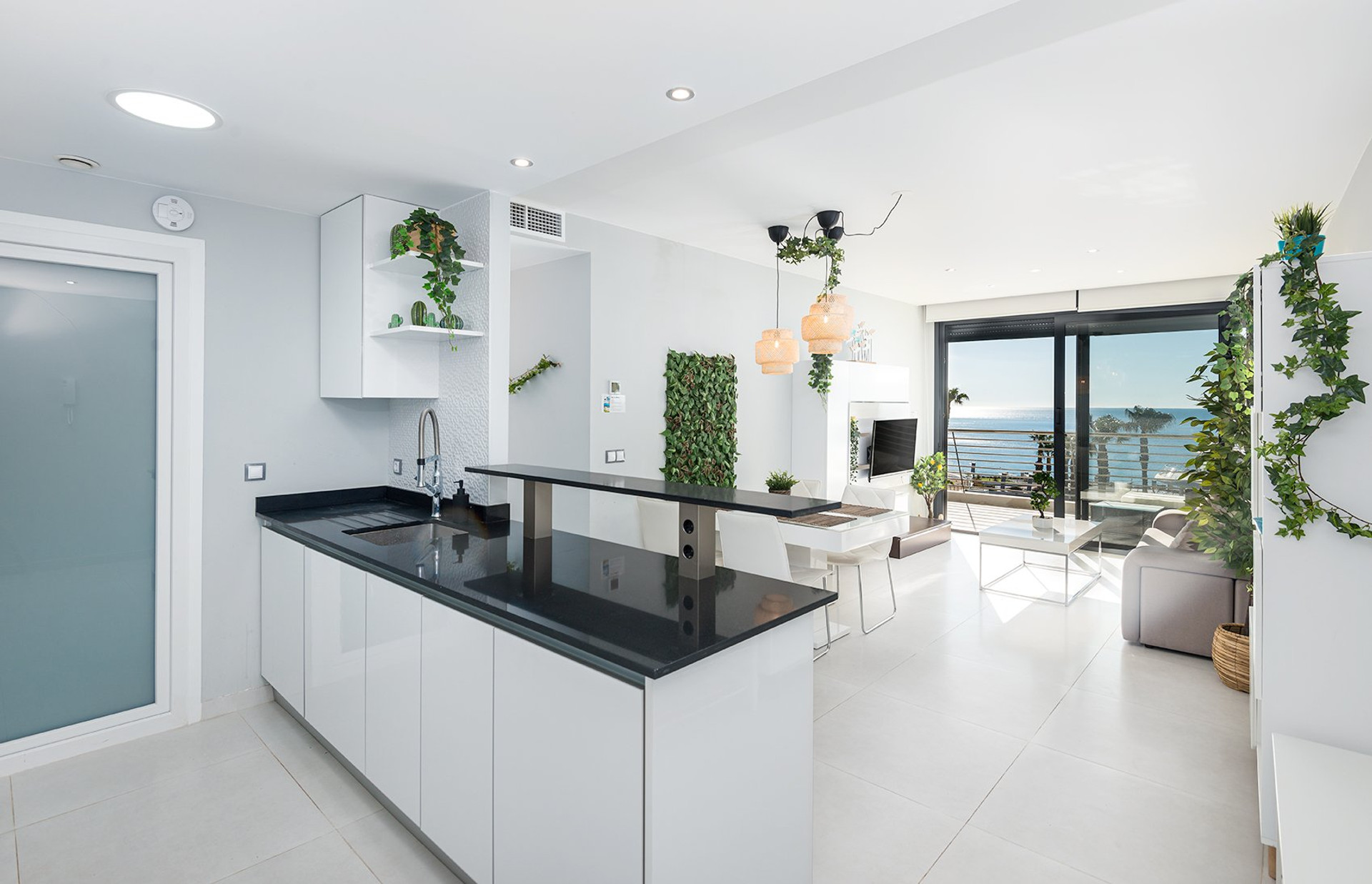 Open kitchen with sea view living room