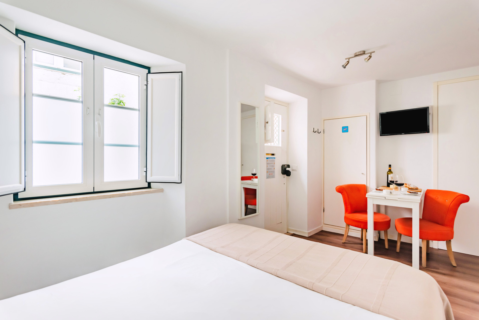 Sleeping area and dining table. Note that the apartment opens directly onto the street.