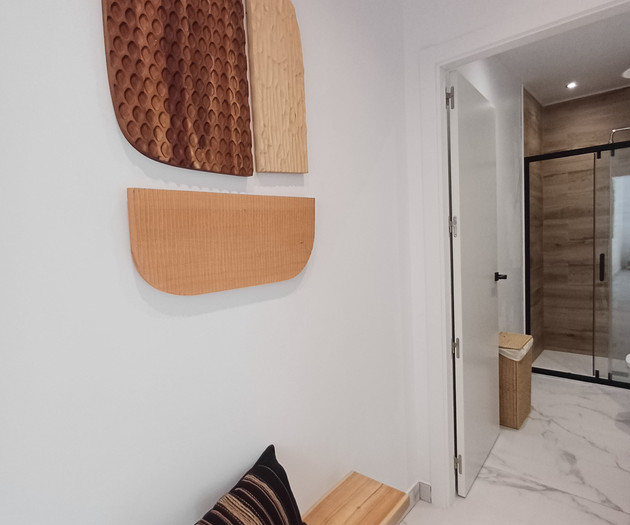 Hallway with decorative wall art