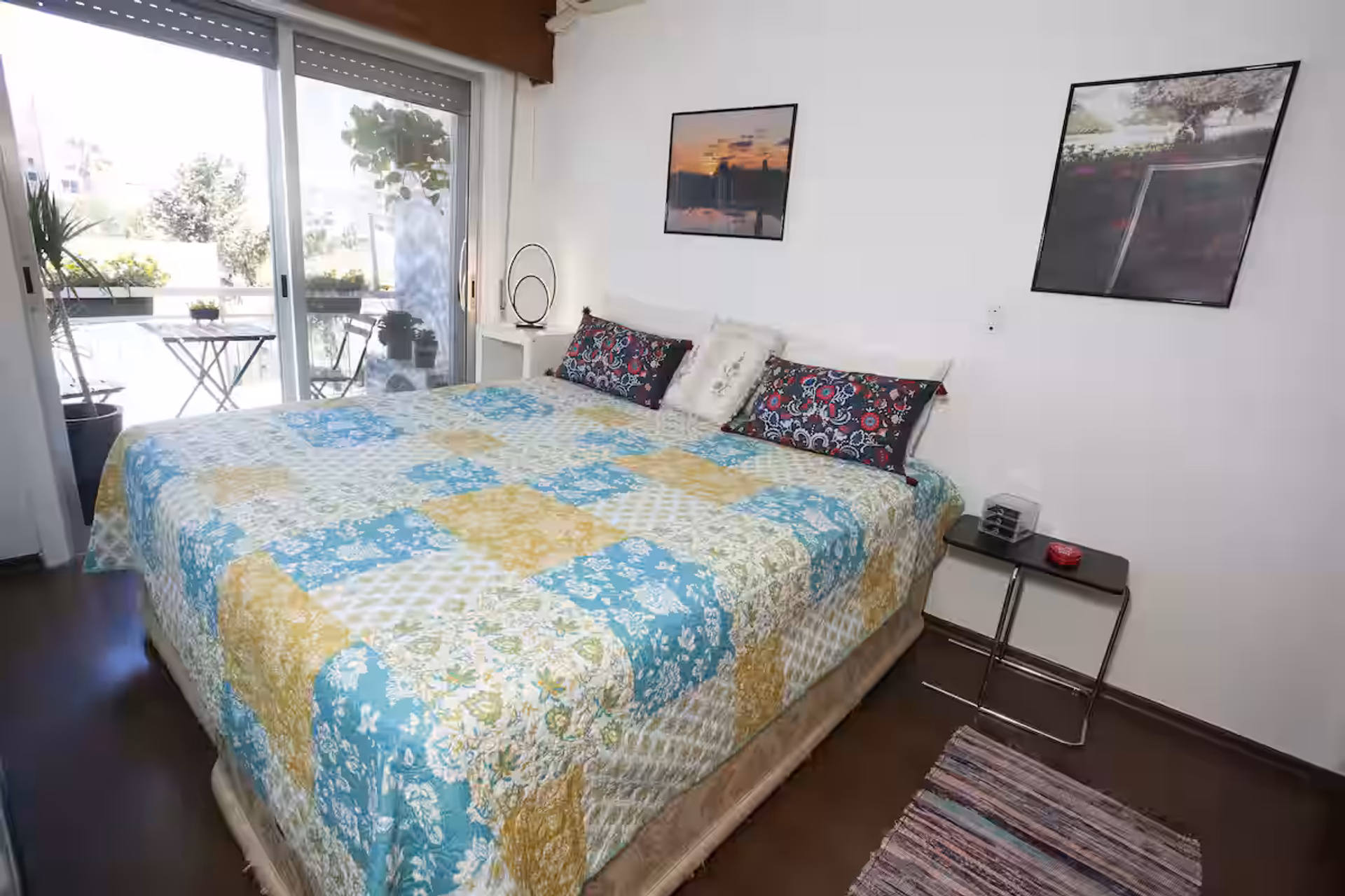 Bedroom with double bed and balcony