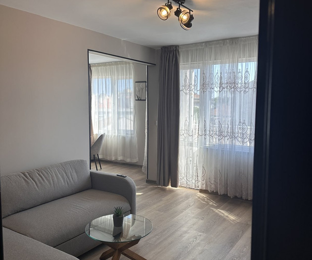 Living room with sofa and mirror