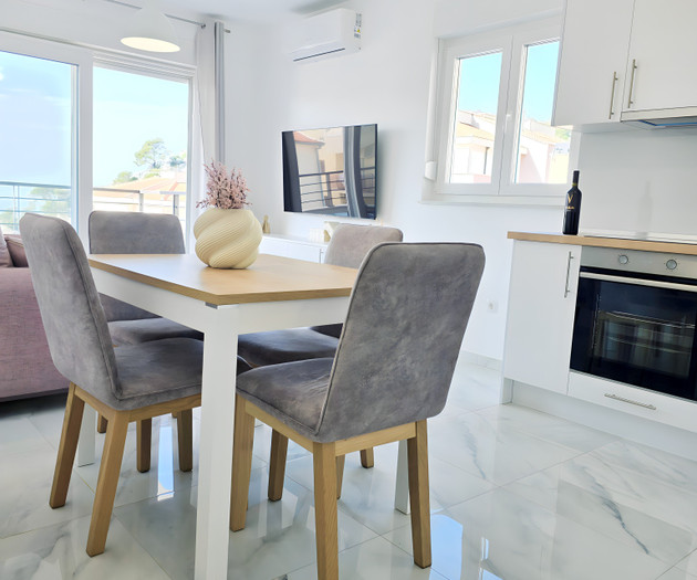 Dining table with kitchen view