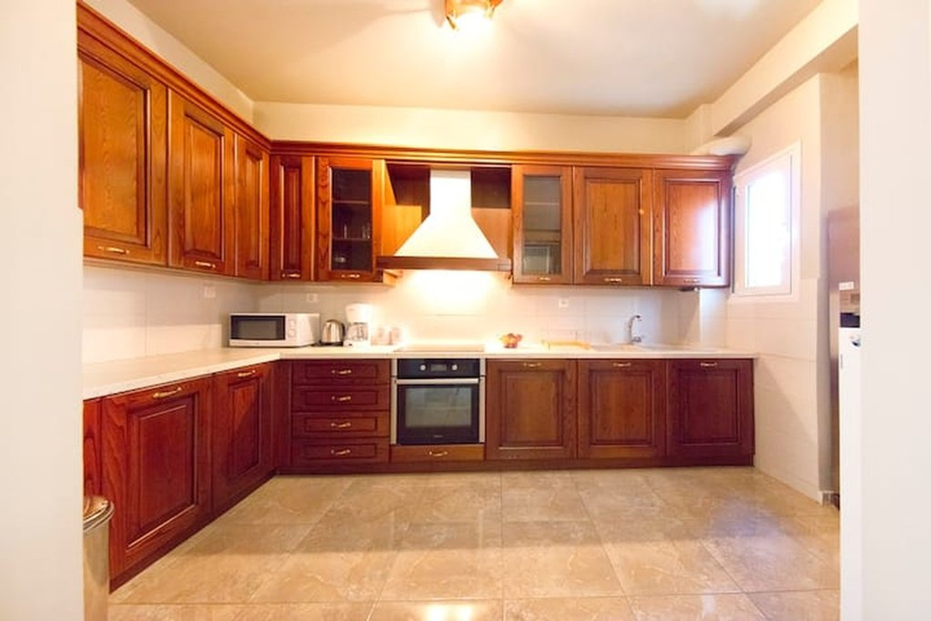 Wooden kitchen with modern appliances