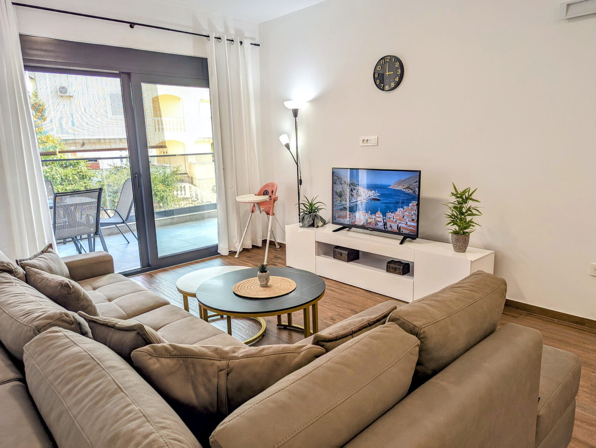 Bright living room with balcony access