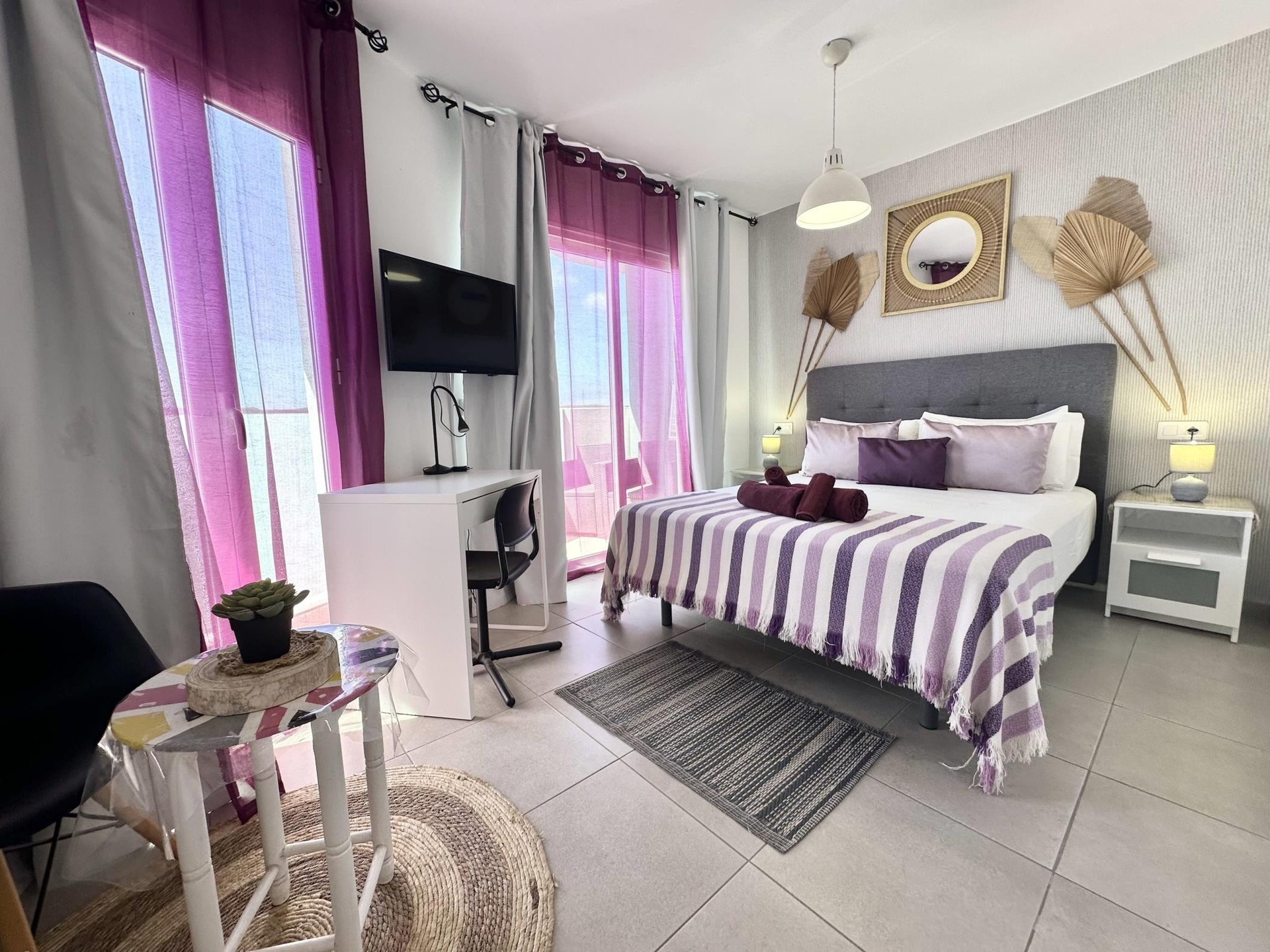 Bright bedroom with balcony access