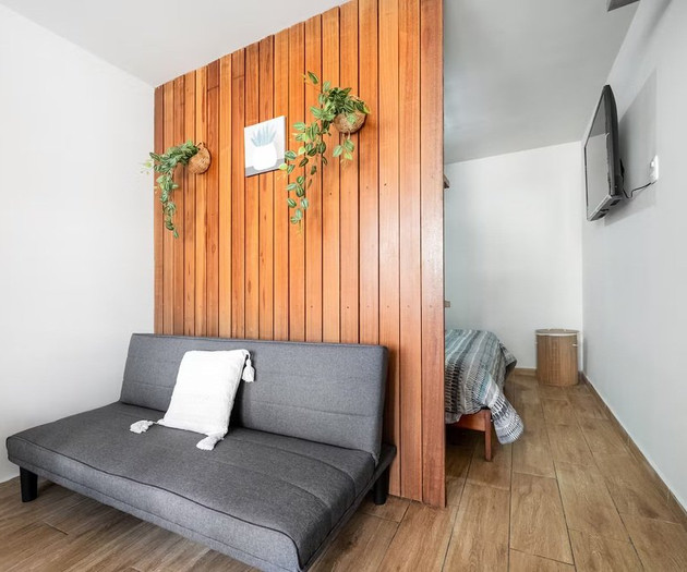 Living room with sofa and bedroom