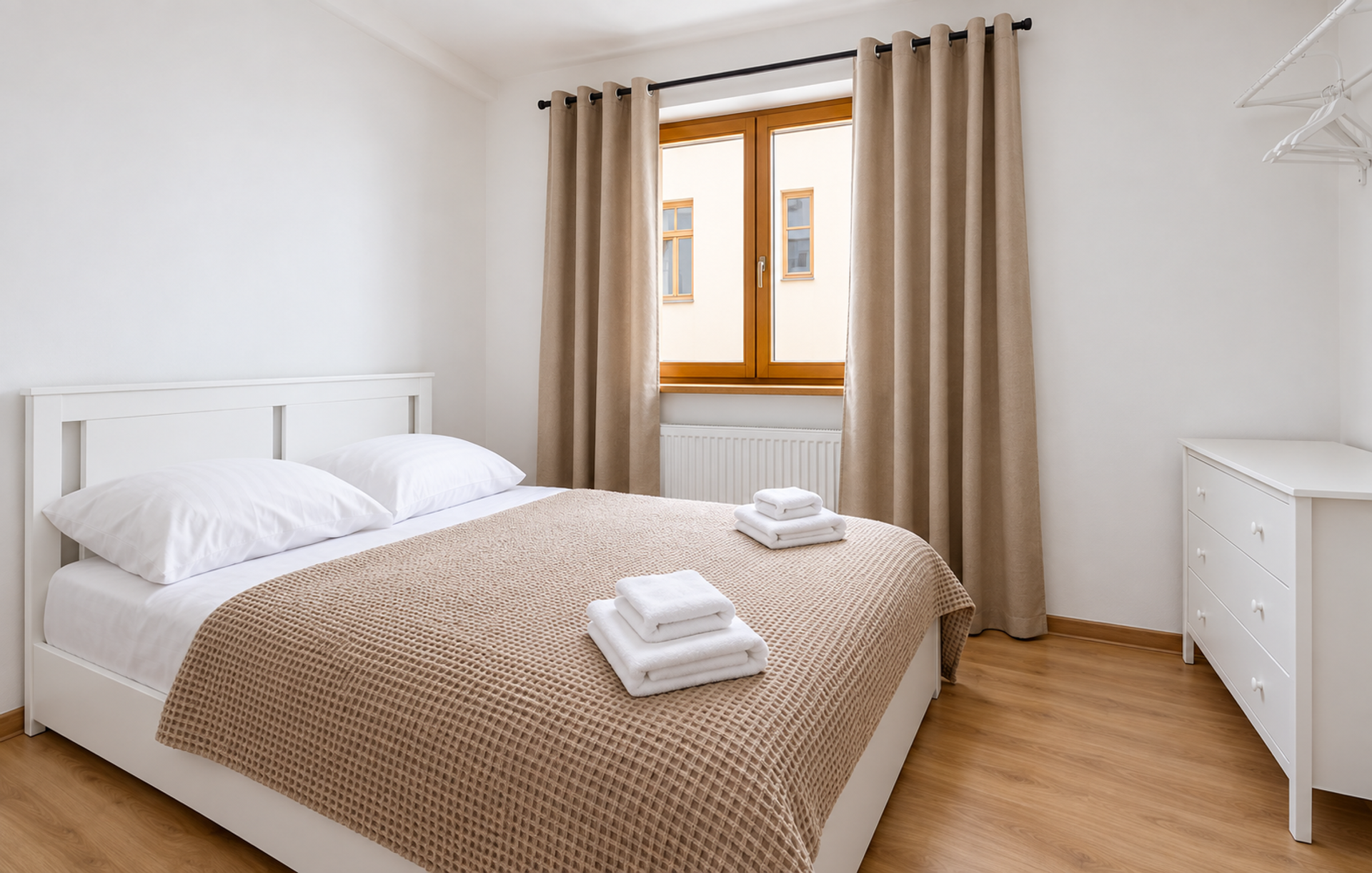 Bright bedroom with double bed
