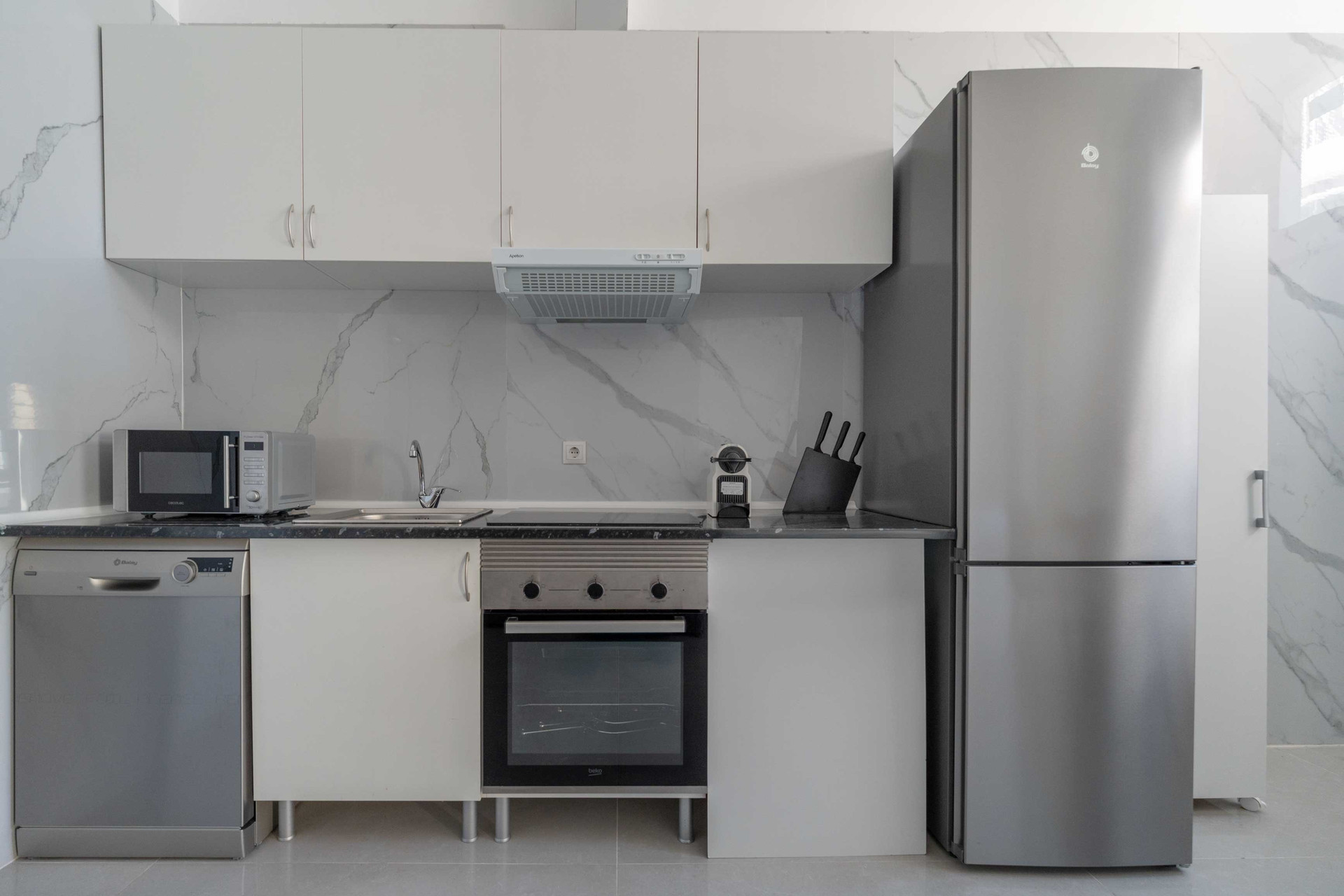 Kitchen with stainless steel appliances