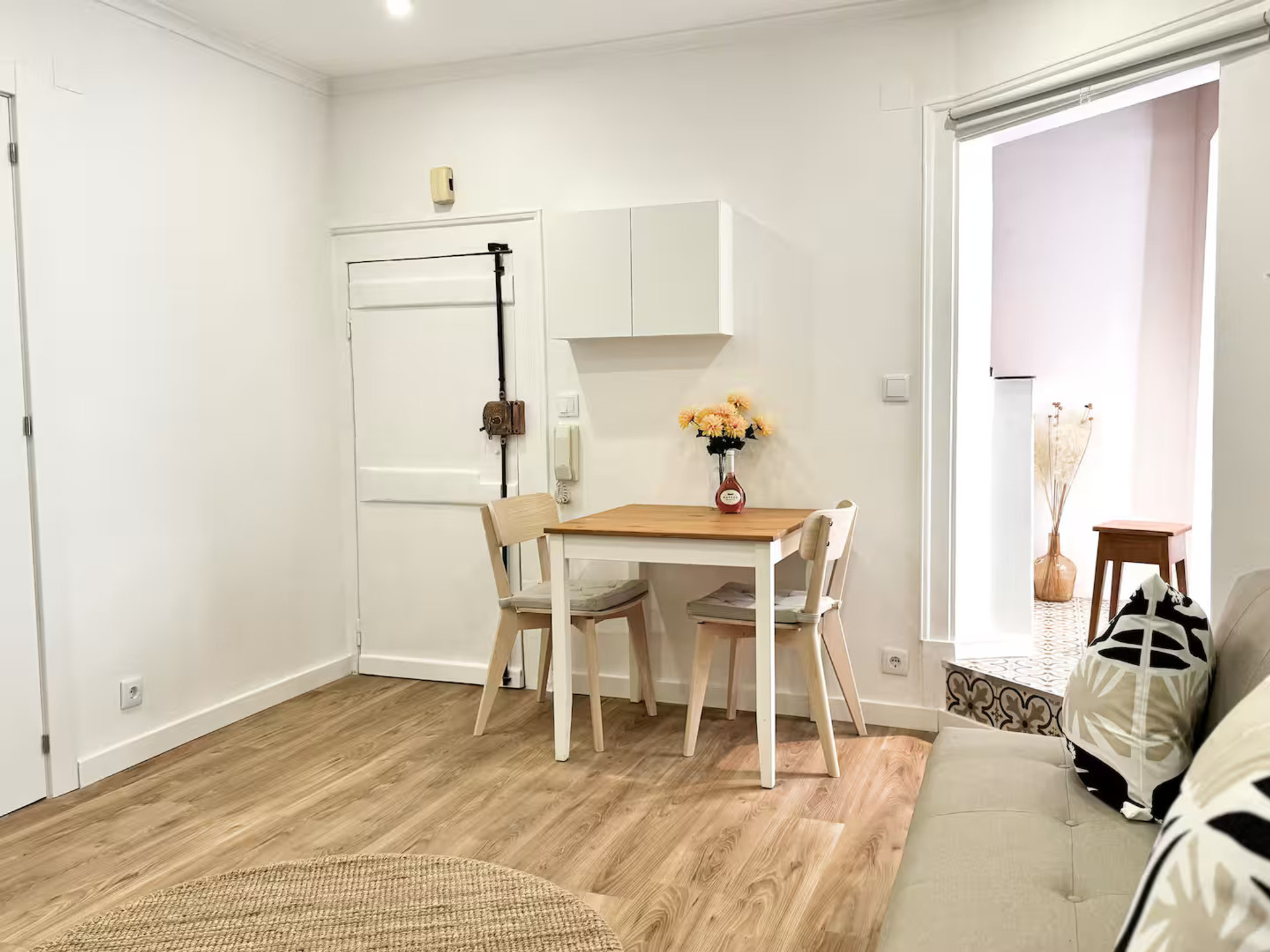Dining table near balcony door
