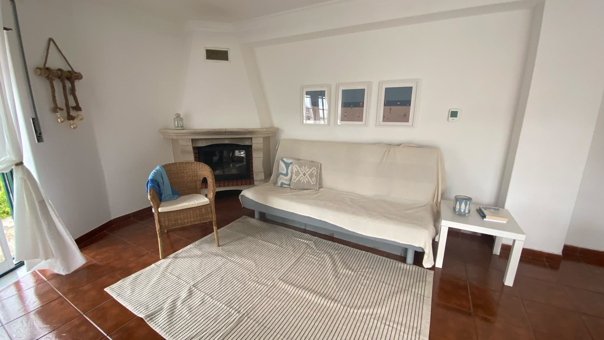 Living room with sofa and fireplace