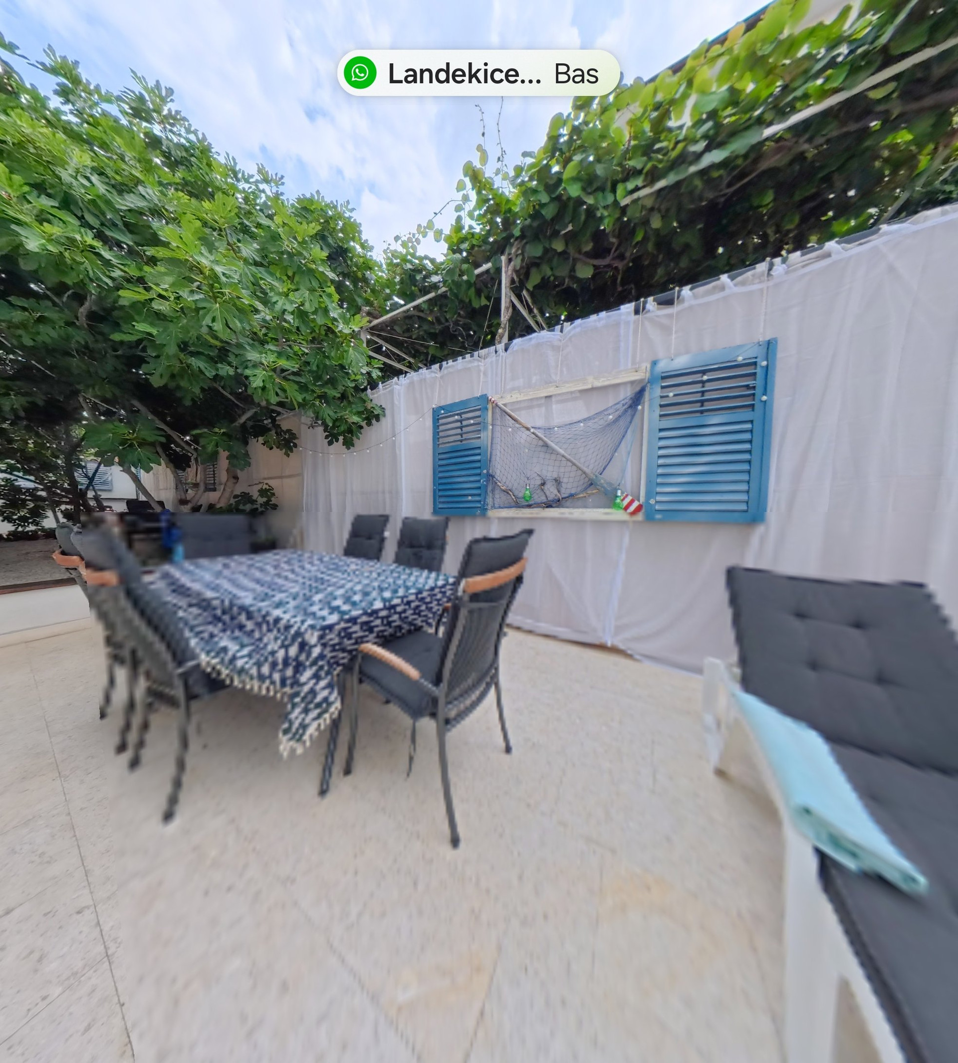 Outdoor dining terrace with table