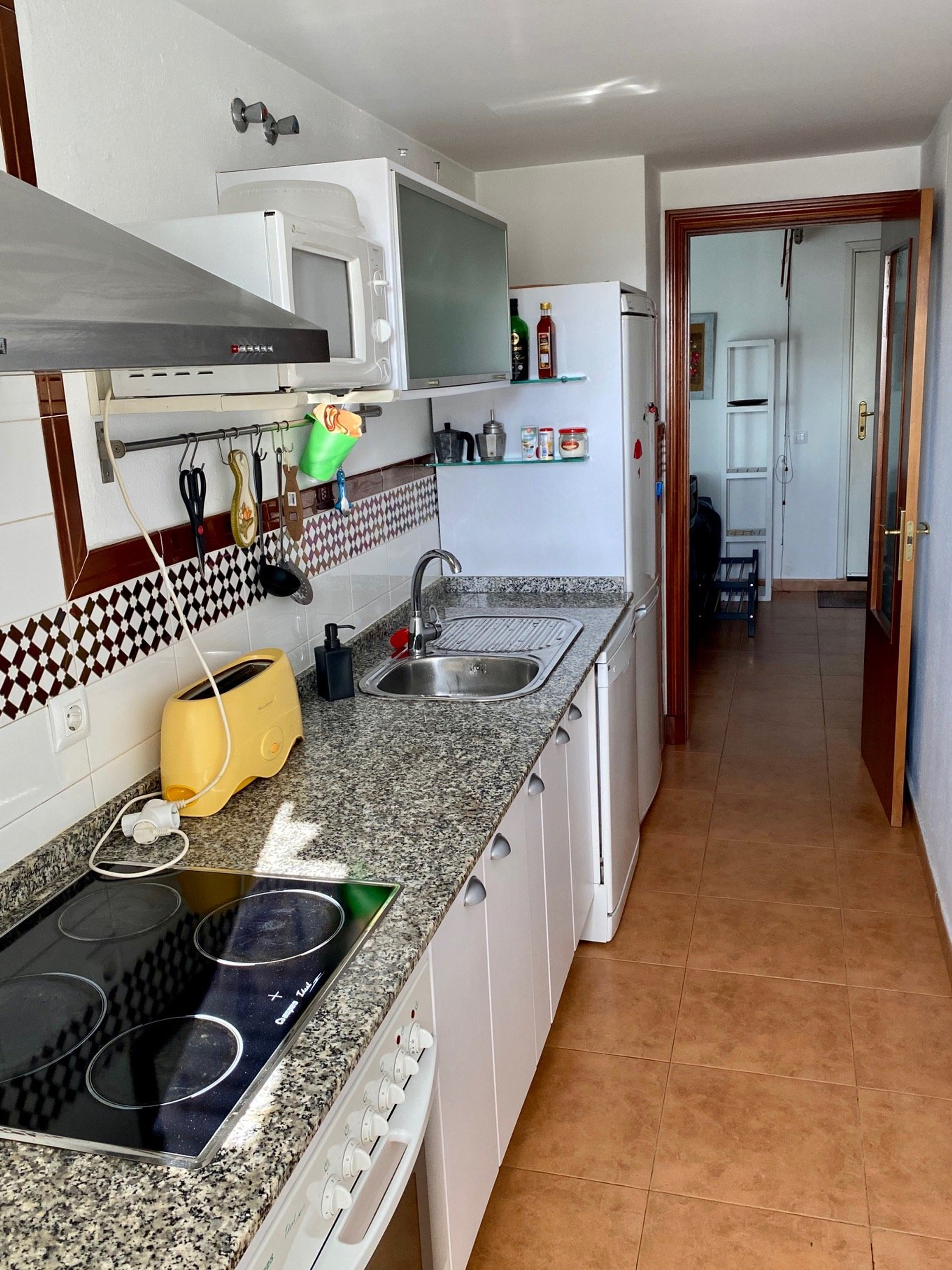 Kitchen with granite countertop