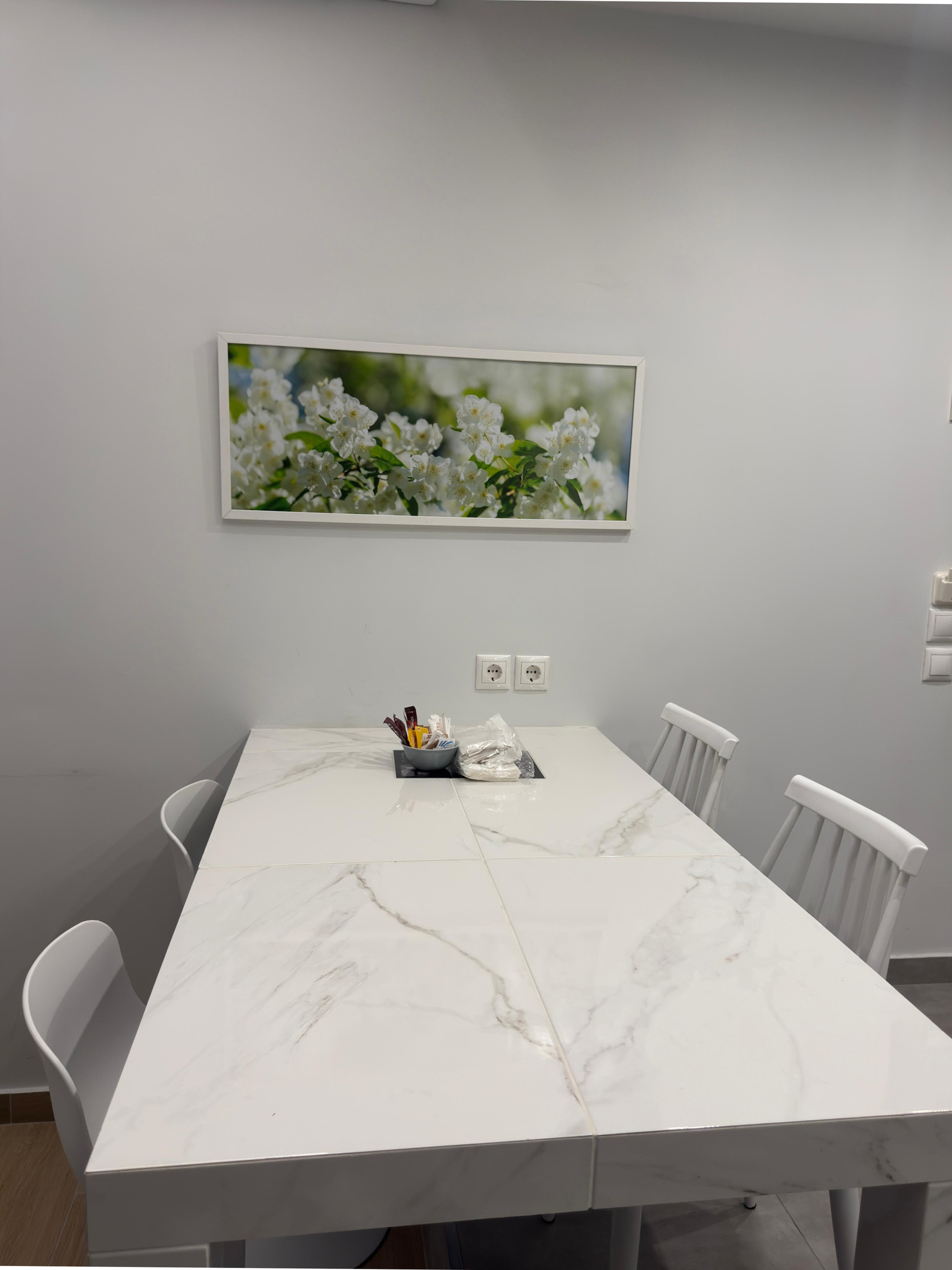 The dining area is the perfect place to enjoy your meals, or to discuss what your next Athenian exploration will be.