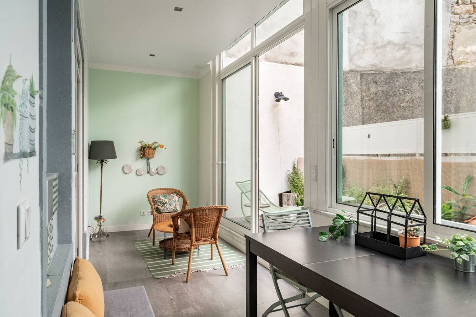 Bright sunroom with seating area