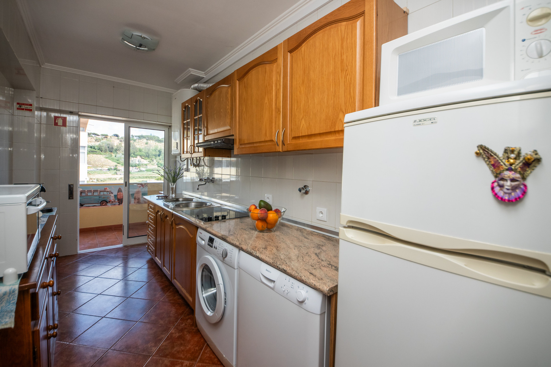 Kitchen with fridge and appliances