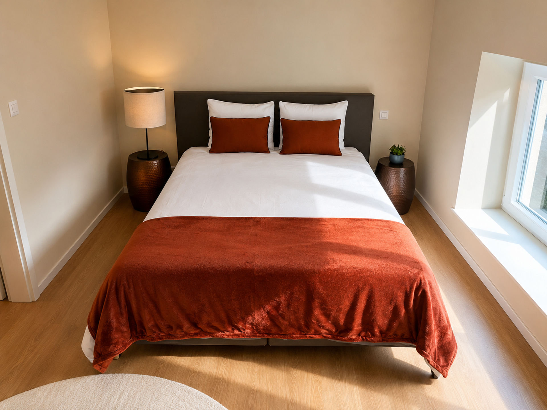 Cozy bedroom with orange accent bedding
