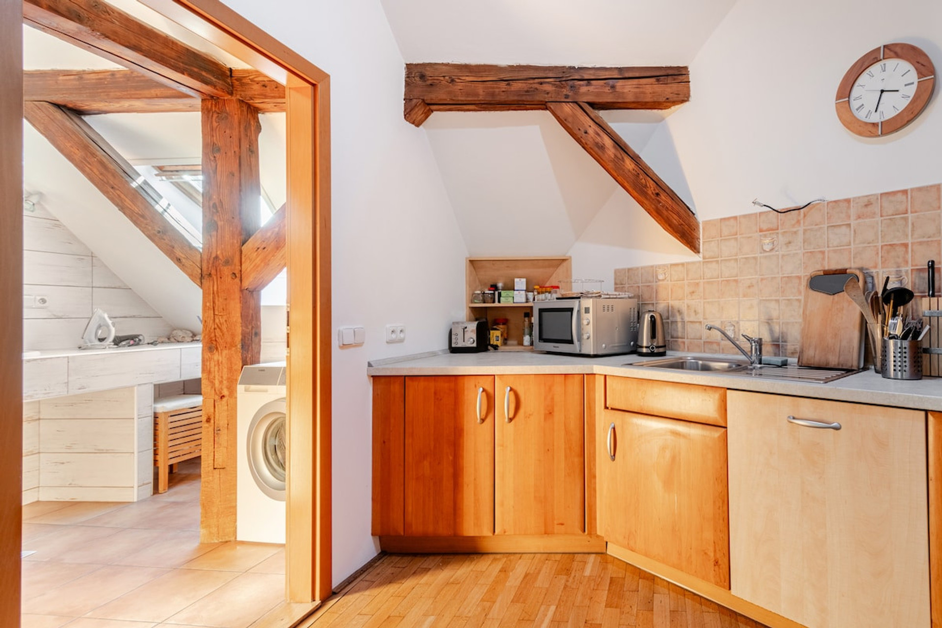 dish-washer is built into cabinet (lighter door). the kitchen has all what's needed: blender, pans, plates, cups, knives, cutlery, etc (all nicely hidden in the cabinets). 