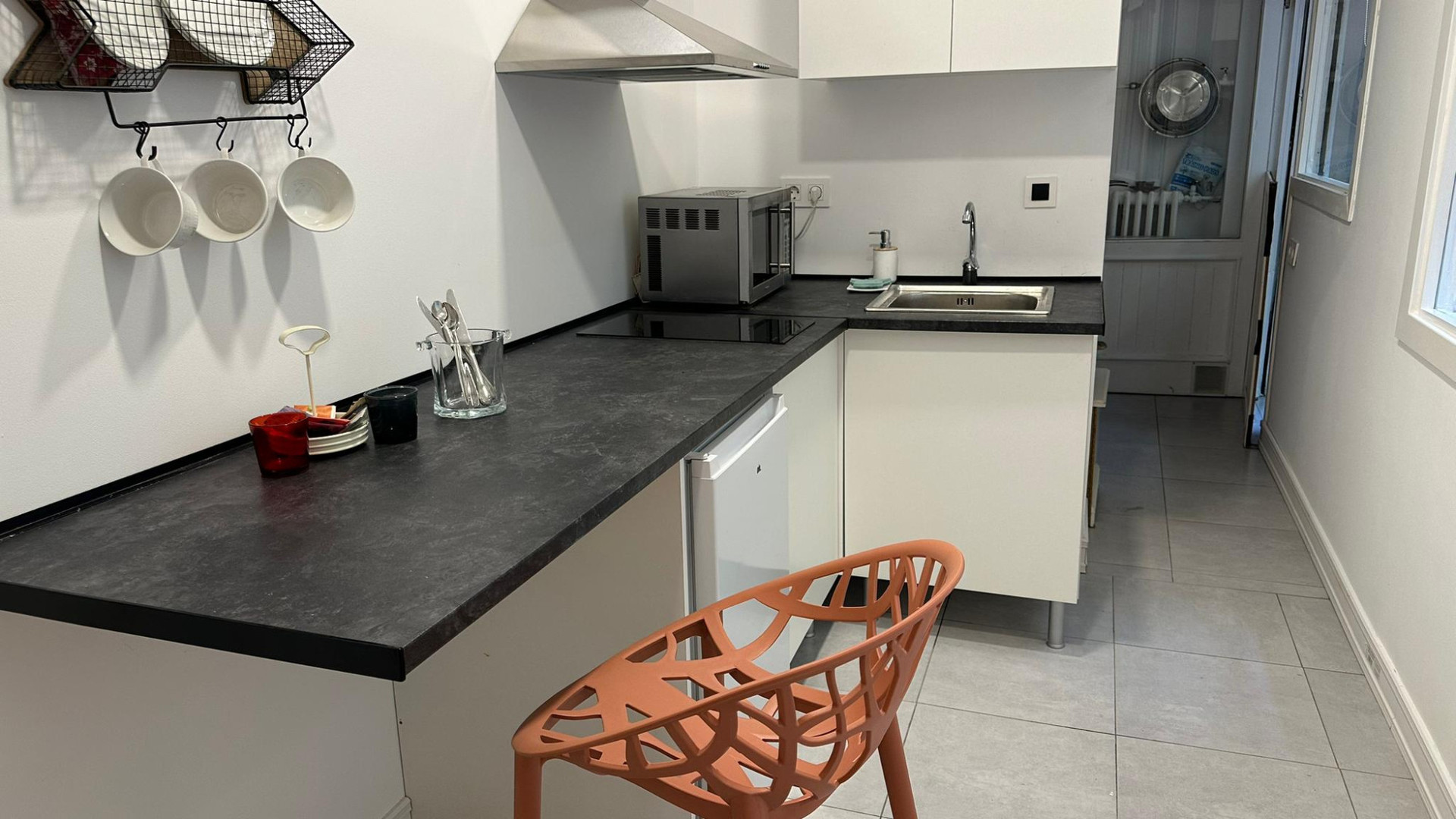 White kitchen with bar stool