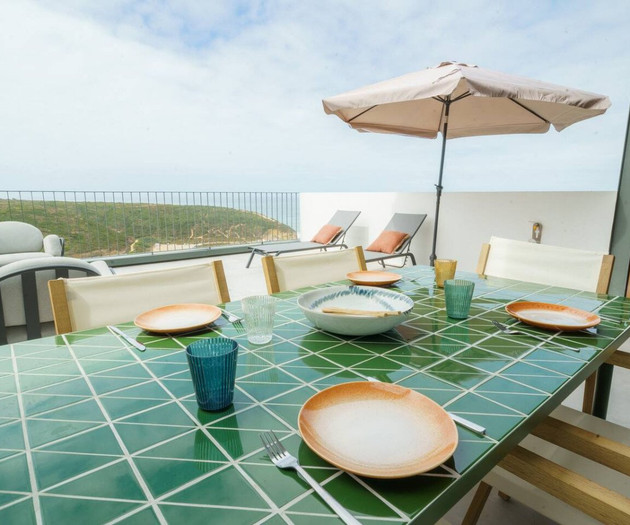 Green tiled dining table outdoors