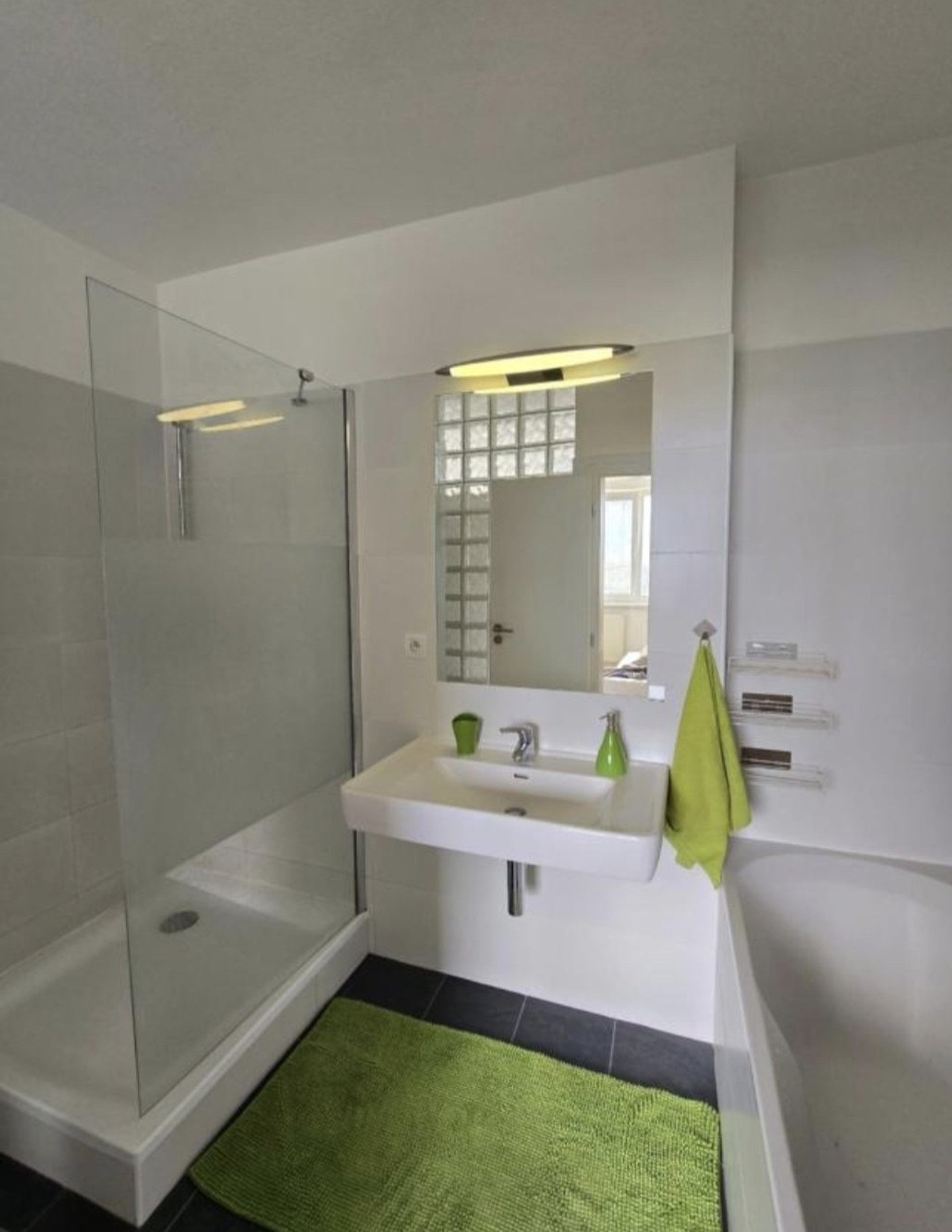 Bathroom with shower tub and sink