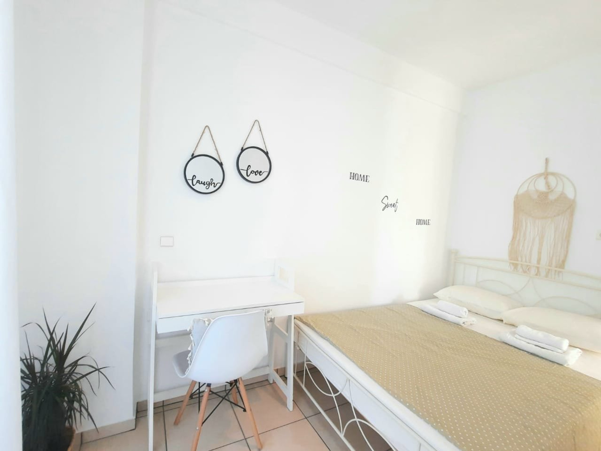 Bright bedroom with desk workspace