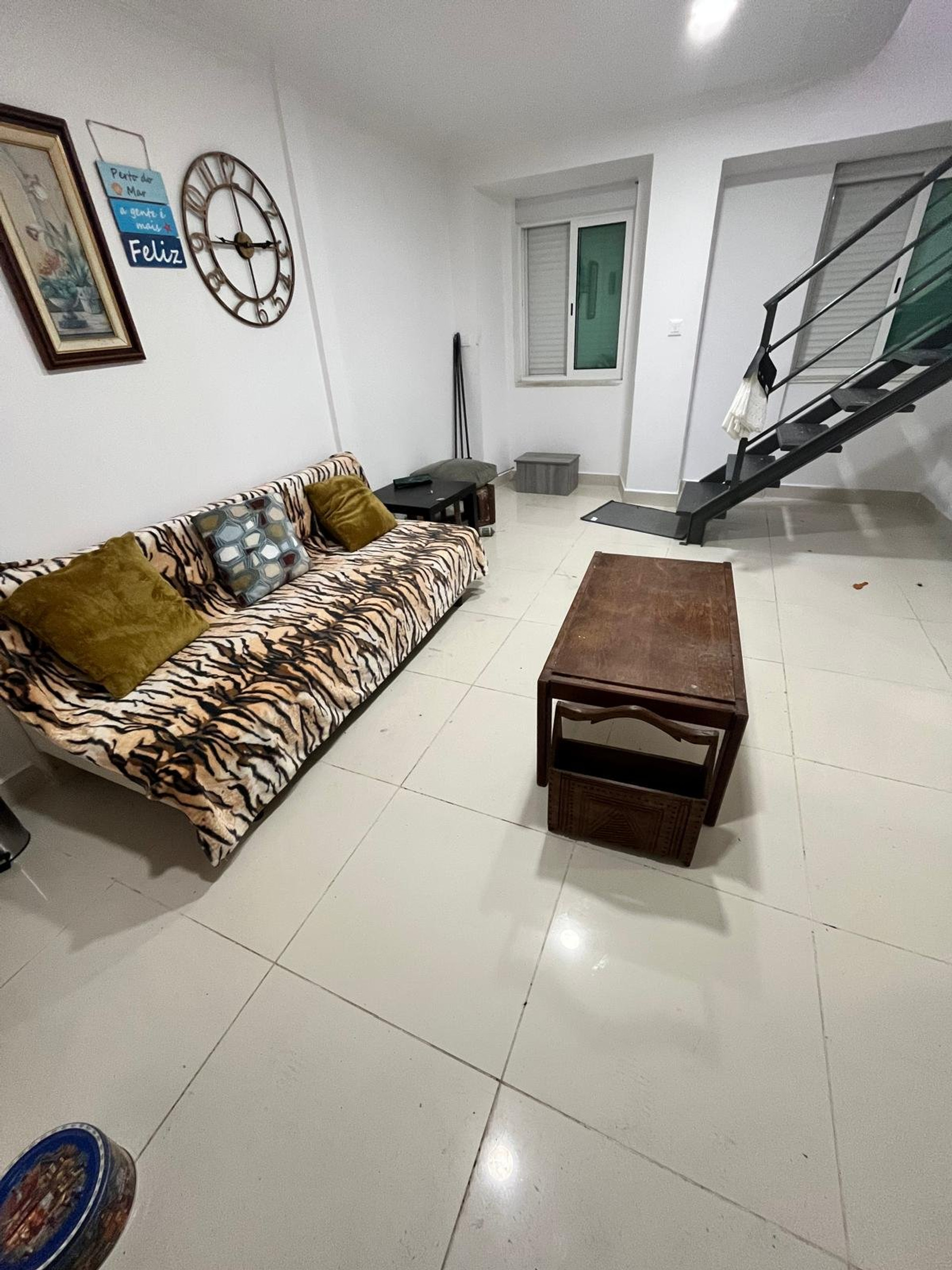 Living room with sofa staircase