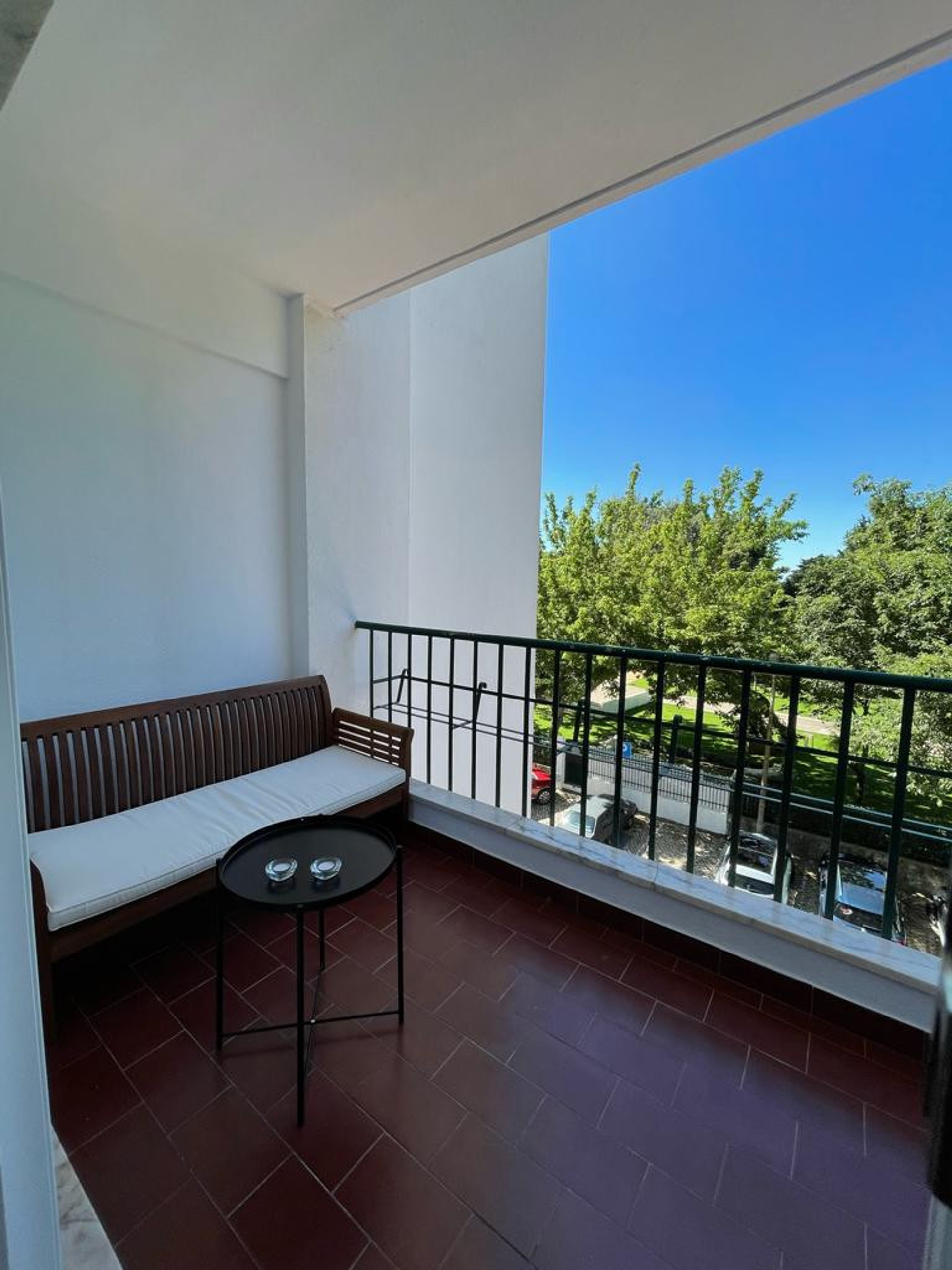 South-facing balcony overlooking Parque da Alagoa.