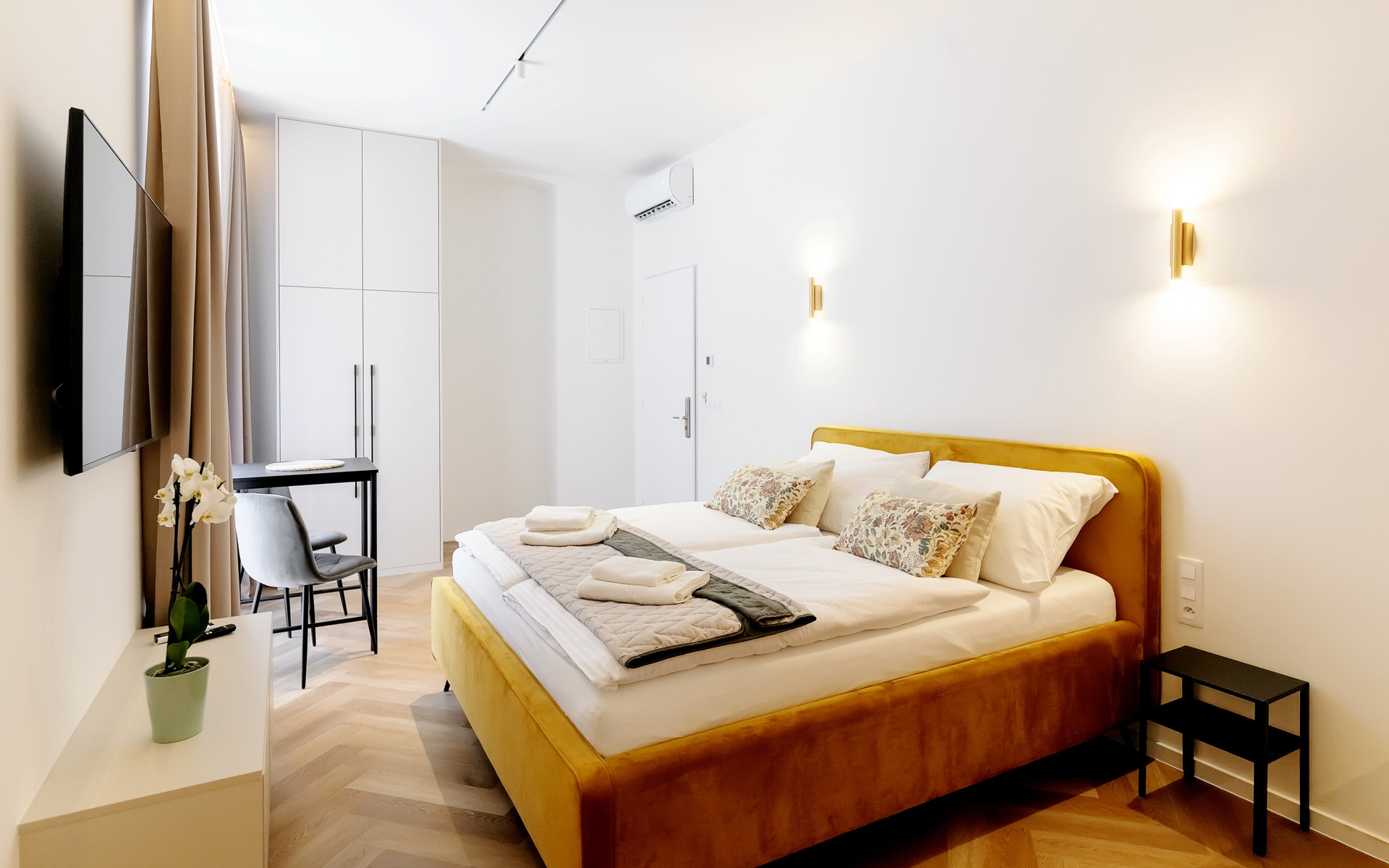 Studio overview with wardrobe and desk
